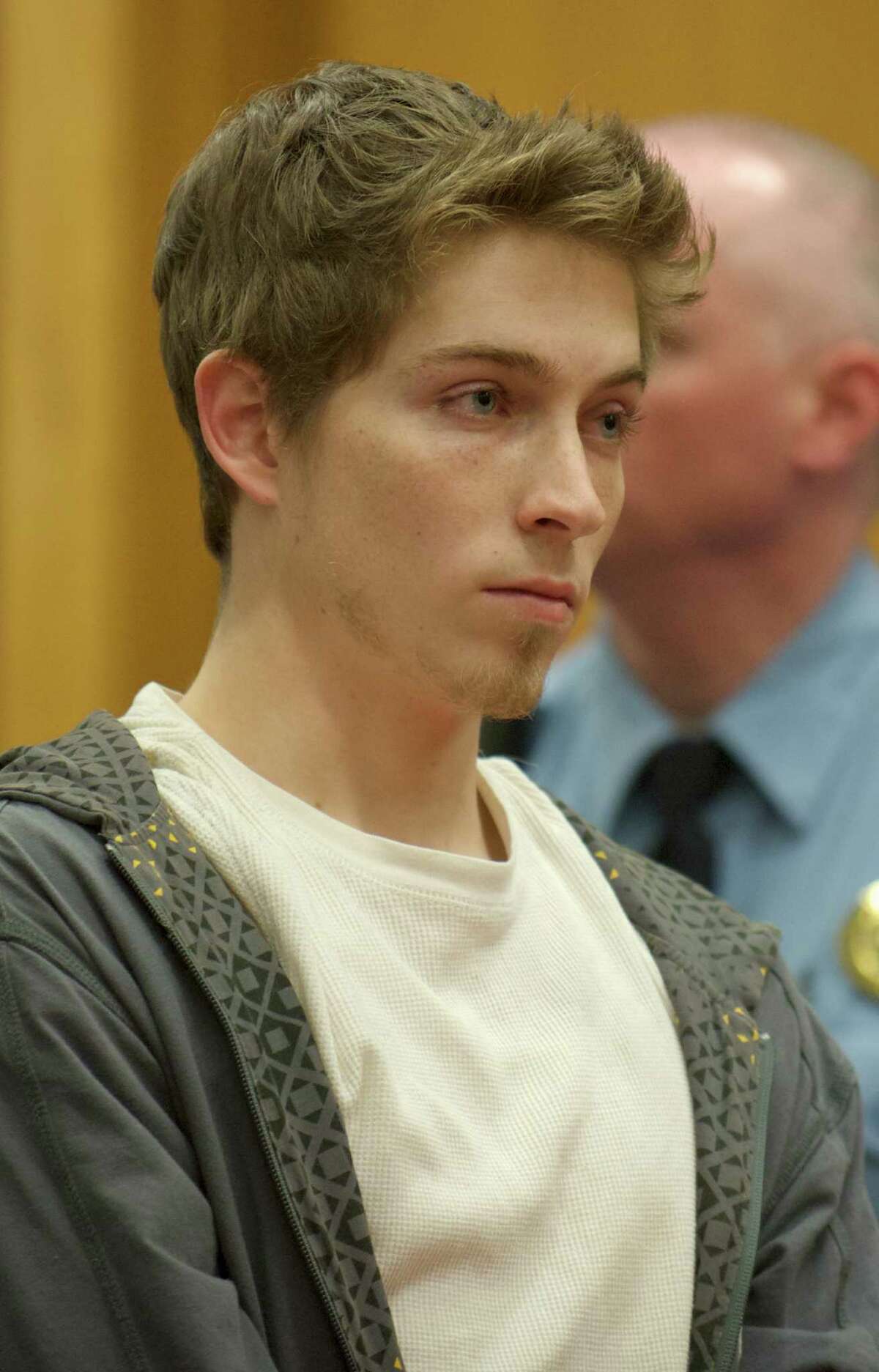 Alexander Lee, 21, appears in superior court in Danbury, Conn, on Wednesday , December 4, 2013,for his arraignment on charges he fled the scene after a cyclist from Weston hit his car on Route 302 in Bethel earlier this year. He was held on $150,000 bail.