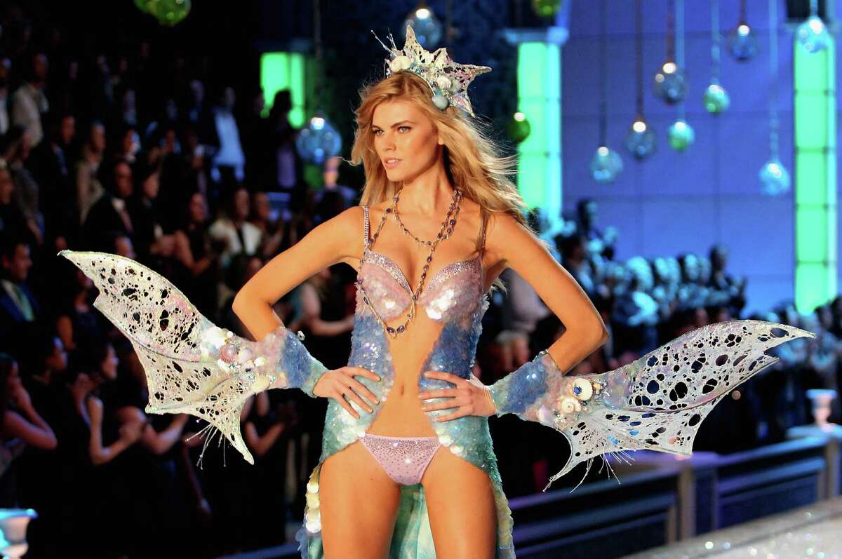 2011: Maryna Linchuk walks the runway during the 2011 Victoria's Secret Fashion Show at the Lexington Avenue Armory on November 9, 2011 in New York City. (Photo by Kevin Kane/FilmMagic)