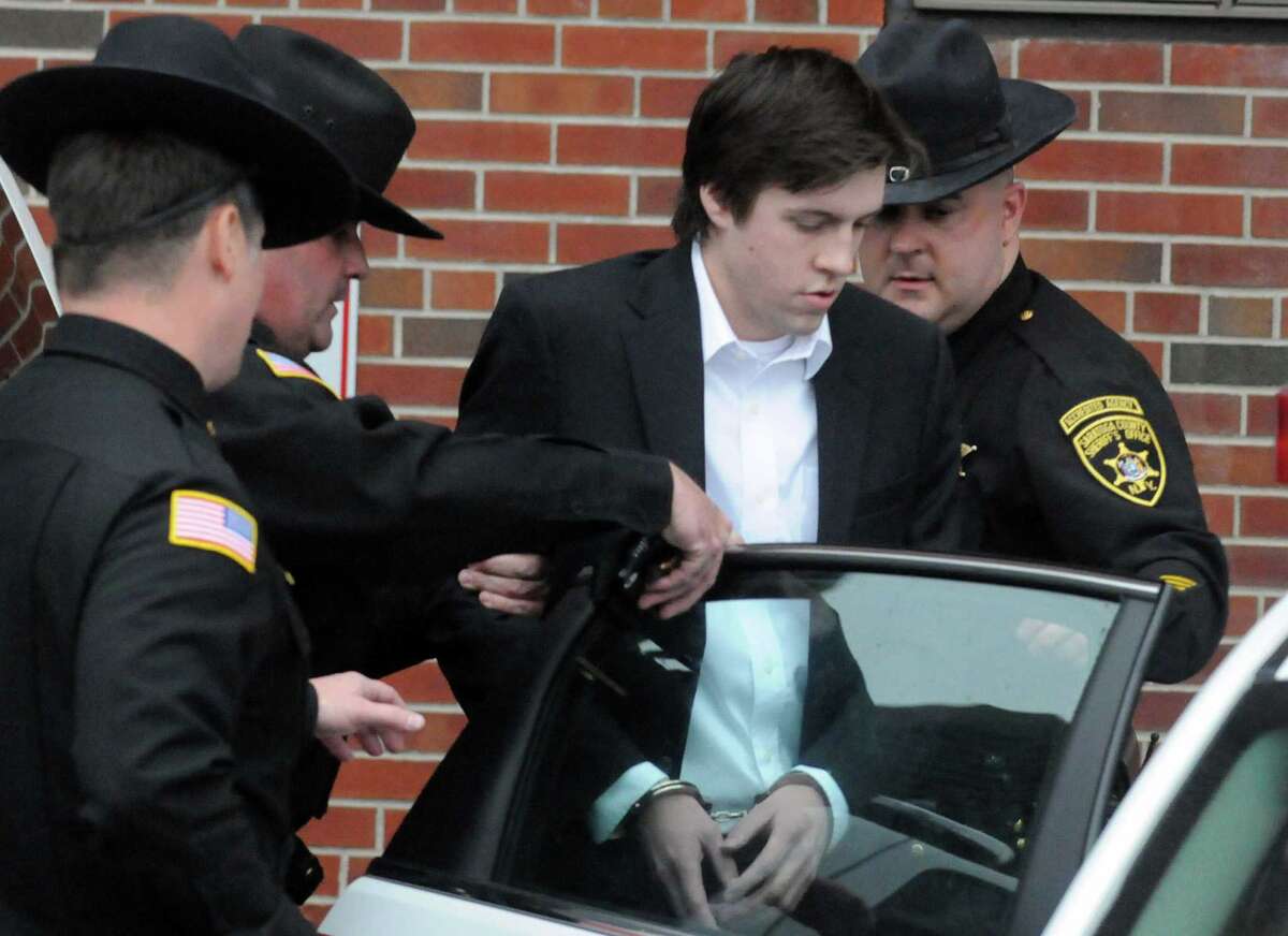 Dennis Drue is lead out of the Saratoga County Court House by Saratoga Sheriff deputies following his sentencing Thursday afternoon, Dec. 5, 2013, in Ballston Spa, N.Y. Drue was sentenced to 5-15 years after pleading guilty to felony charges regarding the Northway crash which killed Chris Stewart and Deanna Rivers just over a year ago. (Michael P. Farrell/Times Union) )