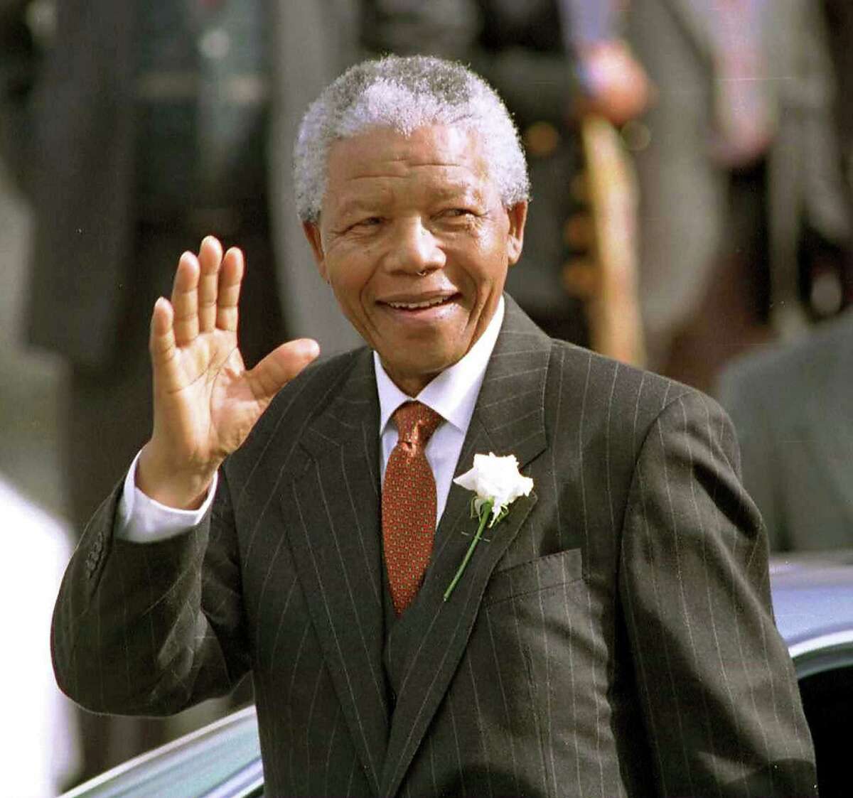 South African President Nelson Mandela makes his way to Parliament in Cape Town, South Africa, in this May 9, 1994, file photo. Mandela died on Thursday. He became an icon for freedom and equality.