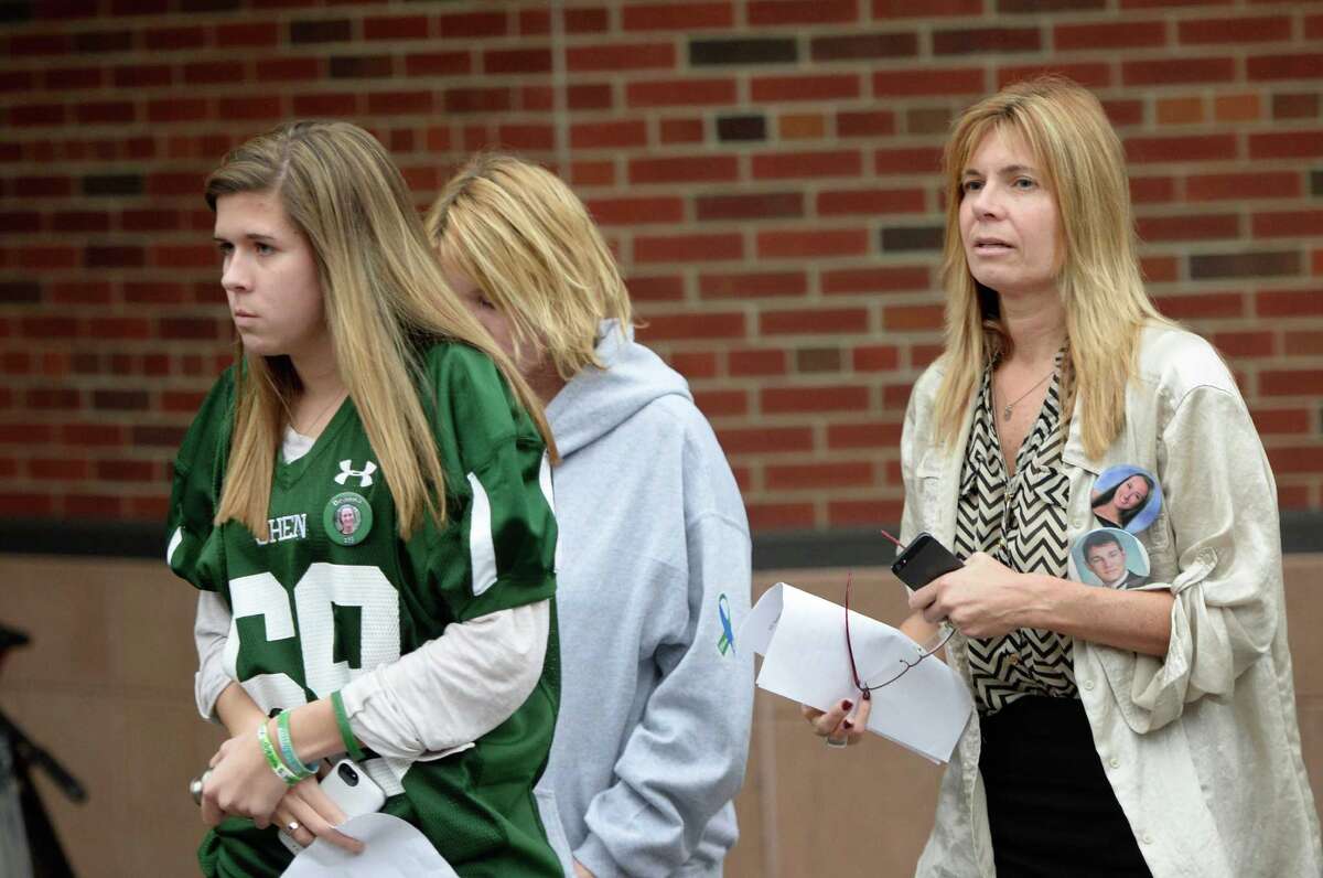 Baily Wind, left, followed by her mother Dawn Wind leave Saratoga County Courthouse Thursday afternoon, Dec. 5, 2013, in Ballston Spa, N.Y. Drue was sentenced to 5-15 years after pleading guilty to felony charges regarding the Northway crash which killed Chris Stewart and Deanna Rivers just over a year ago. (Michael P. Farrell/Times Union)