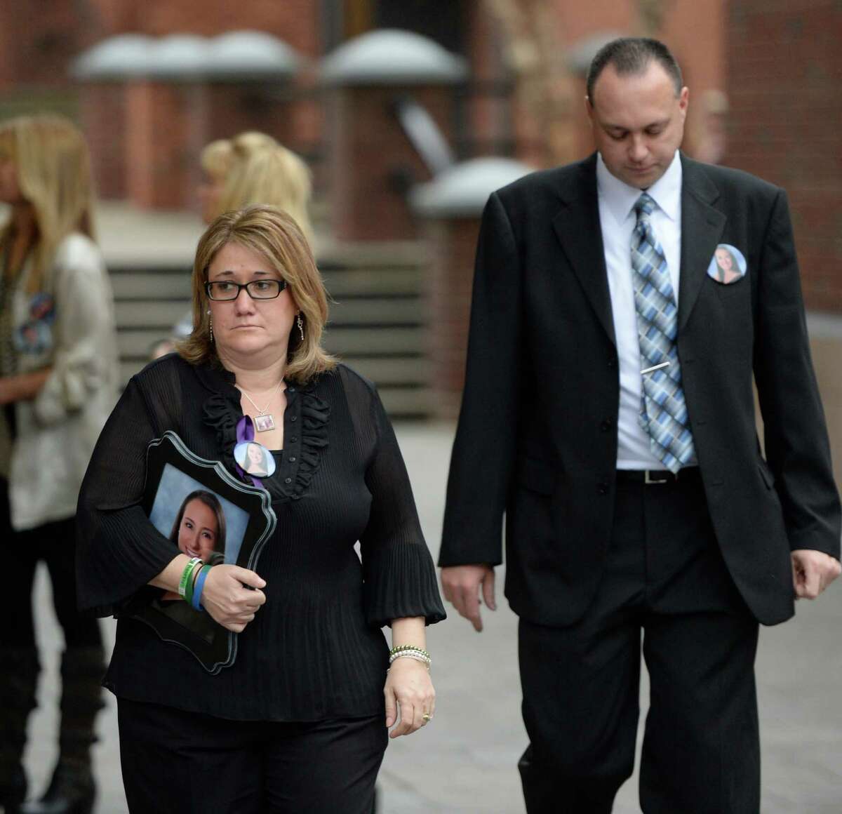 Deborah and Brian Rivers leave Saratoga County Courthouse Thursday afternoon Dec. 5, 2013, in Ballston Spa, N.Y., followng the sentencing of Dennis Drue. Drue was sentenced to 5-15 years after pleading guilty to felony charges regarding the Northway crash which killed Chris Stewart and Deanna Rivers just over a year ago. (Skip Dickstein/Times Union).
