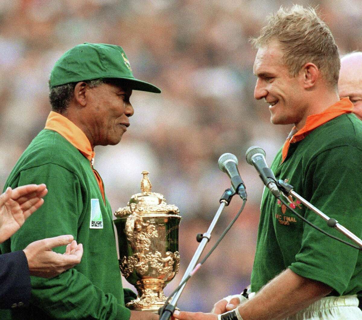 Nelson Mandela (left) chats with South Africa rugby captain Francois Pienaar after the 1995 World Cup.