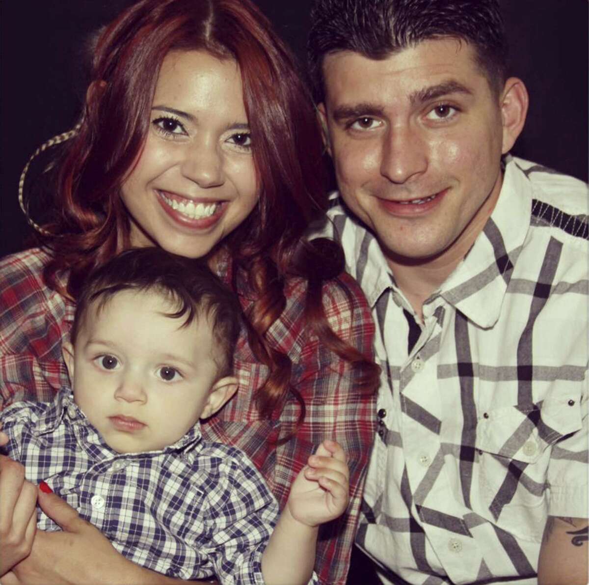Restaurant worker Mathew Jackson, 29, with his wife, Erica Fitts, 28, and their son, Jasper, who now is 3 years old.