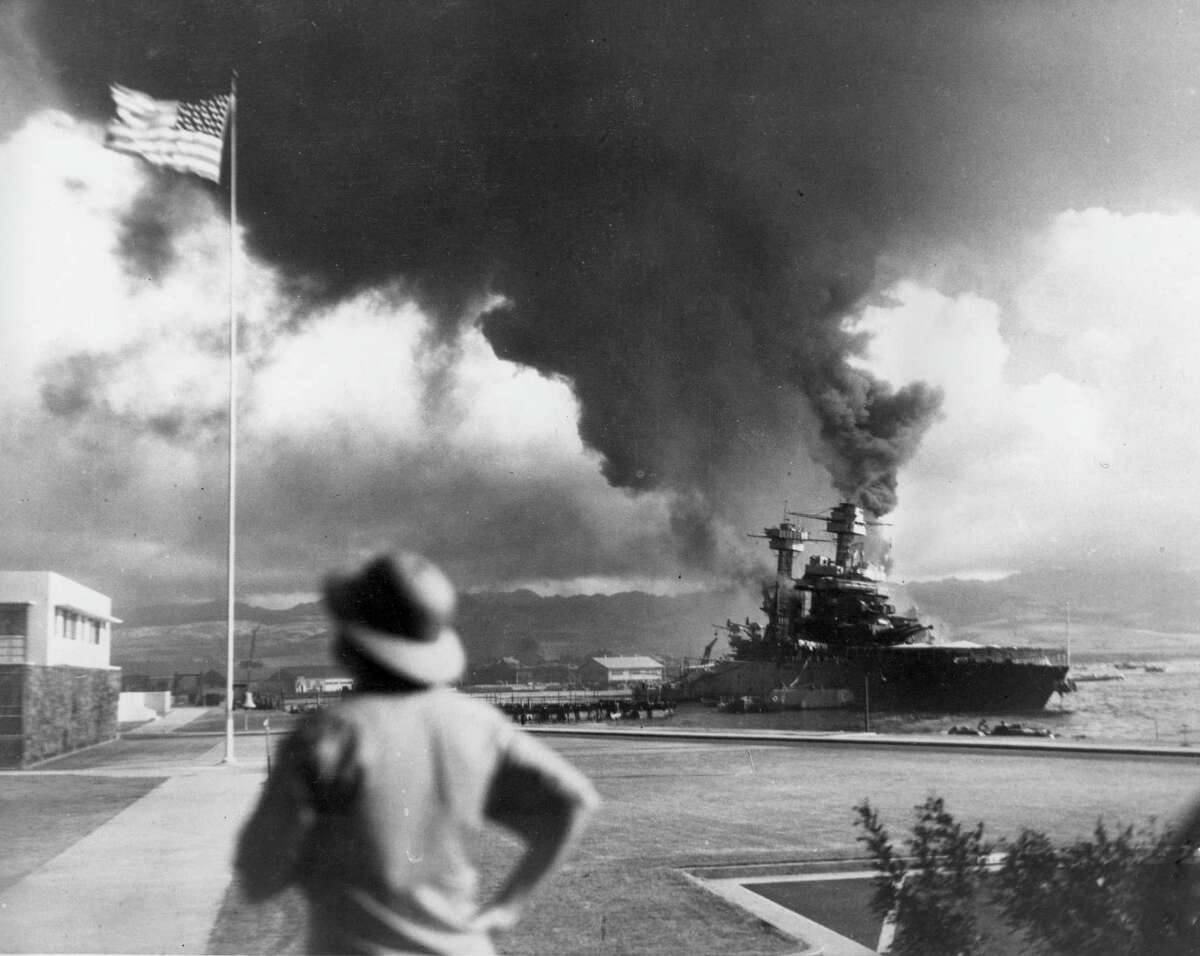 American ships burn during the Japanese attack on Pearl Harbor, Hawaii, on Dec. 7, 1942.