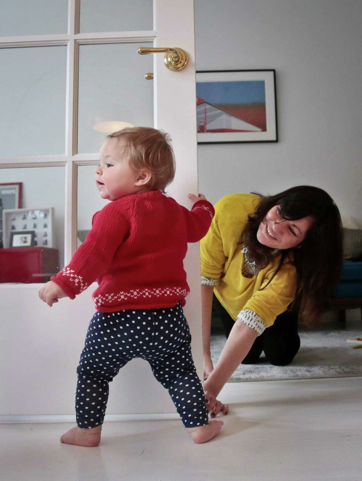 Shirin Majid plays with daughter Ella Townsend at their home in New York last month. Majid, who works for the Internet startup Quirky, is home during her company's quarterly "blackout" week break from work. CEO Ben Kaufman makes the company stop working and take breaks so employees don't burn out.
