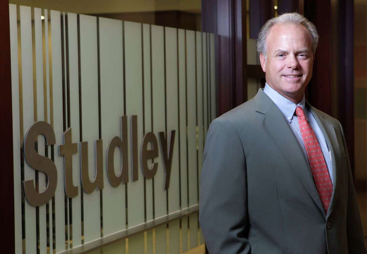 Mark Russell, executive vice president and a co-branch manager of the commercial real estate firm Studley, poses at the office Thursday, Dec. 5, 2013, in Houston. ( Melissa Phillip / Houston Chronicle )