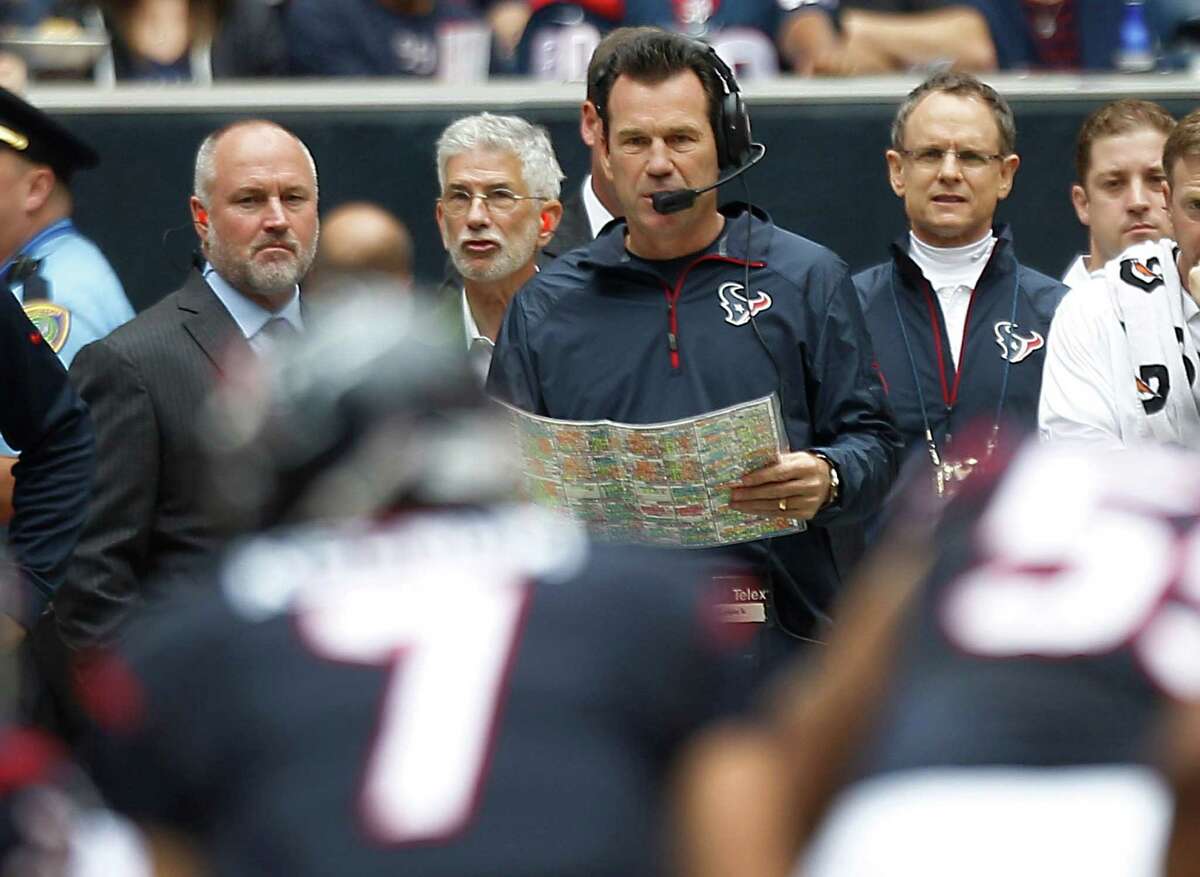 Texans coach Gary Kubiak﻿, center, probably never imagined that this season would end with his firing, and technically it didn't since owner Bob McNair relieved the native Houstonian of his duties Friday with three games remaining.