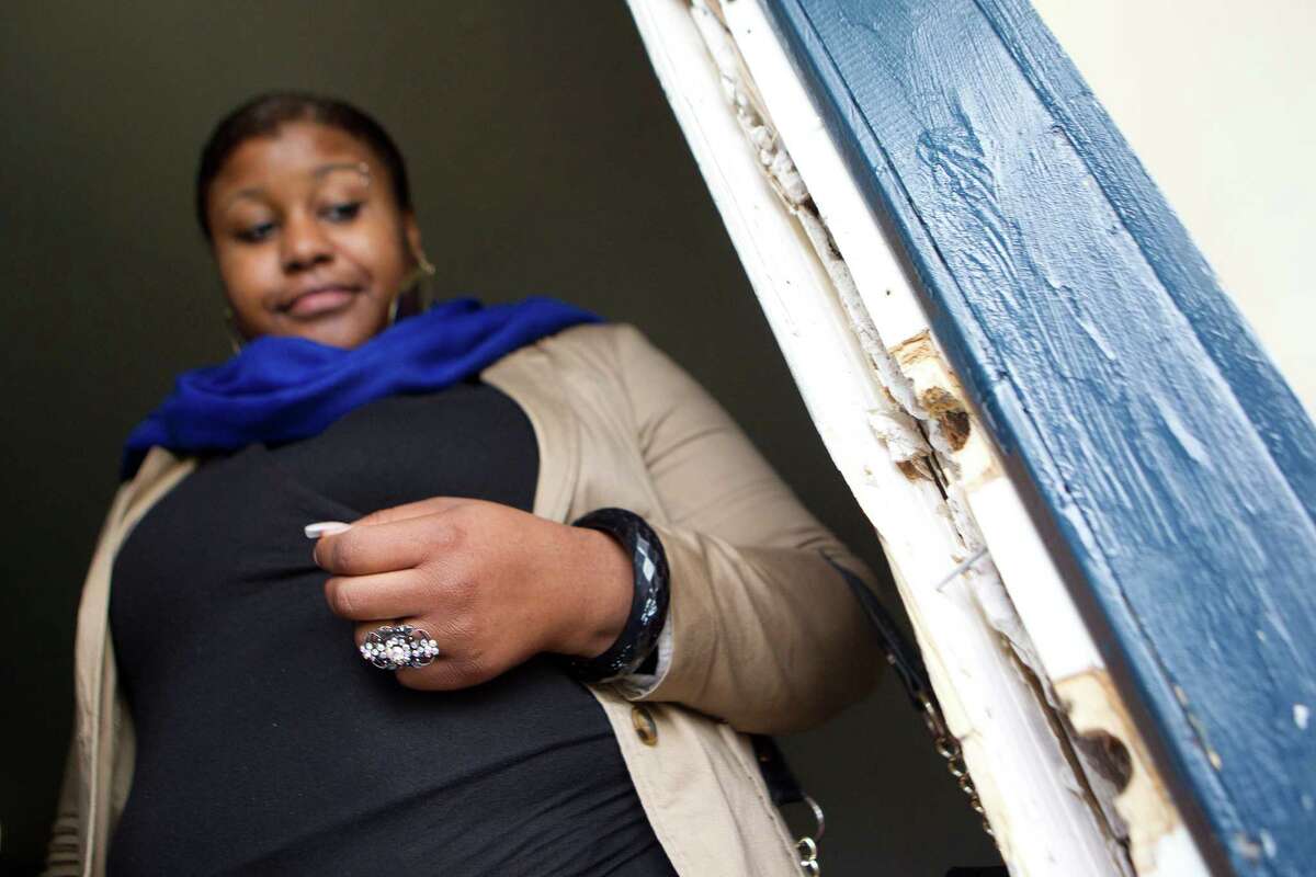 Jacqueline Greene, 27, mother of three children, said the Villa de Cancun apartment management took the front door from her apartment because she was late on her rent.