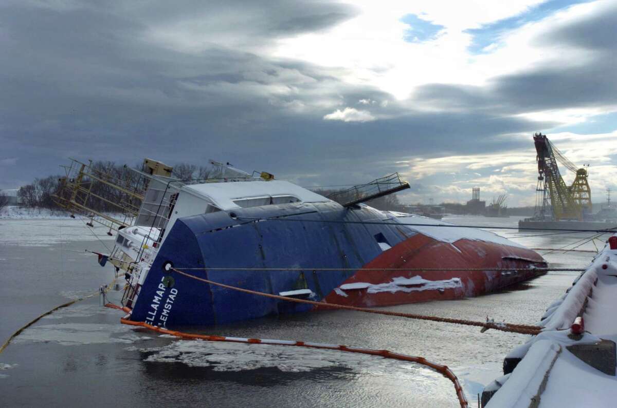 On Dec. 9, 2003, the cargo ship Stellamare capsized in the Port of Albany, killing three Russian sailors. Click through a slideshow of the work to try to rescue the men and right the ship. 