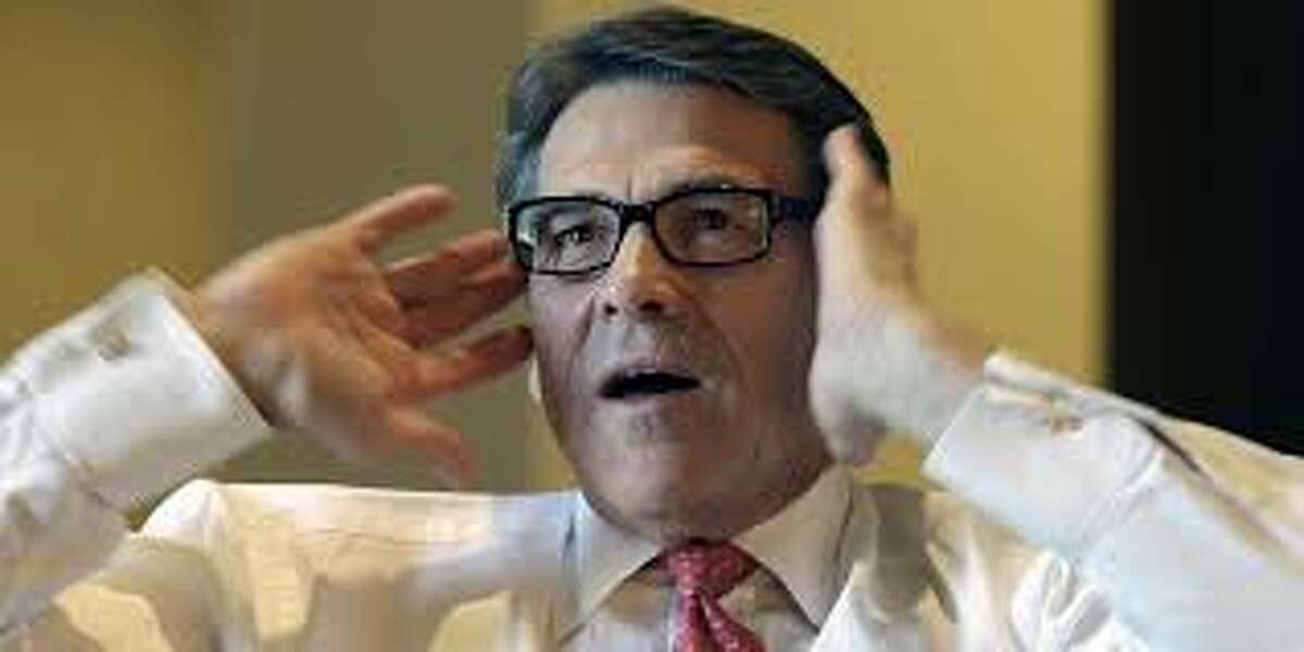 Hair isn't the only thing Governor Perry should be known for. It seems more times than not, he's photographed talking with his hands. 