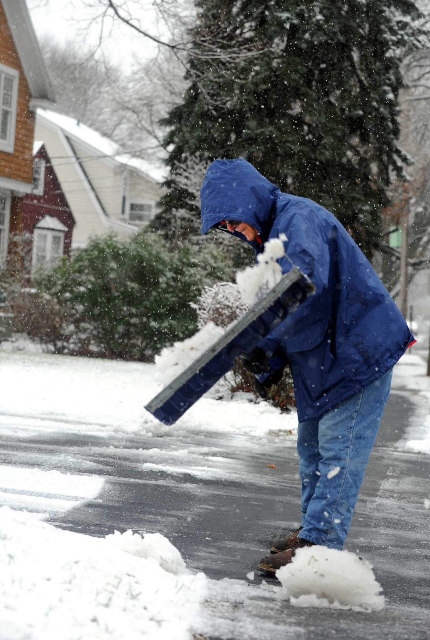 Snow coats roads and closes schools