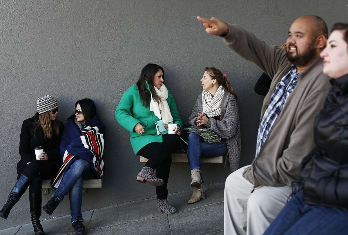 Colleen Miller, (l-r) Betty Woo, Lauren Mizrahi, Jesica Ryzenberg, Martain Bulos and Alex Wara converse amongst themselves while waiting for a table outside Plow on December 7, 2013 in the Potrero Hill neighborhood of San Francisco, Calif.