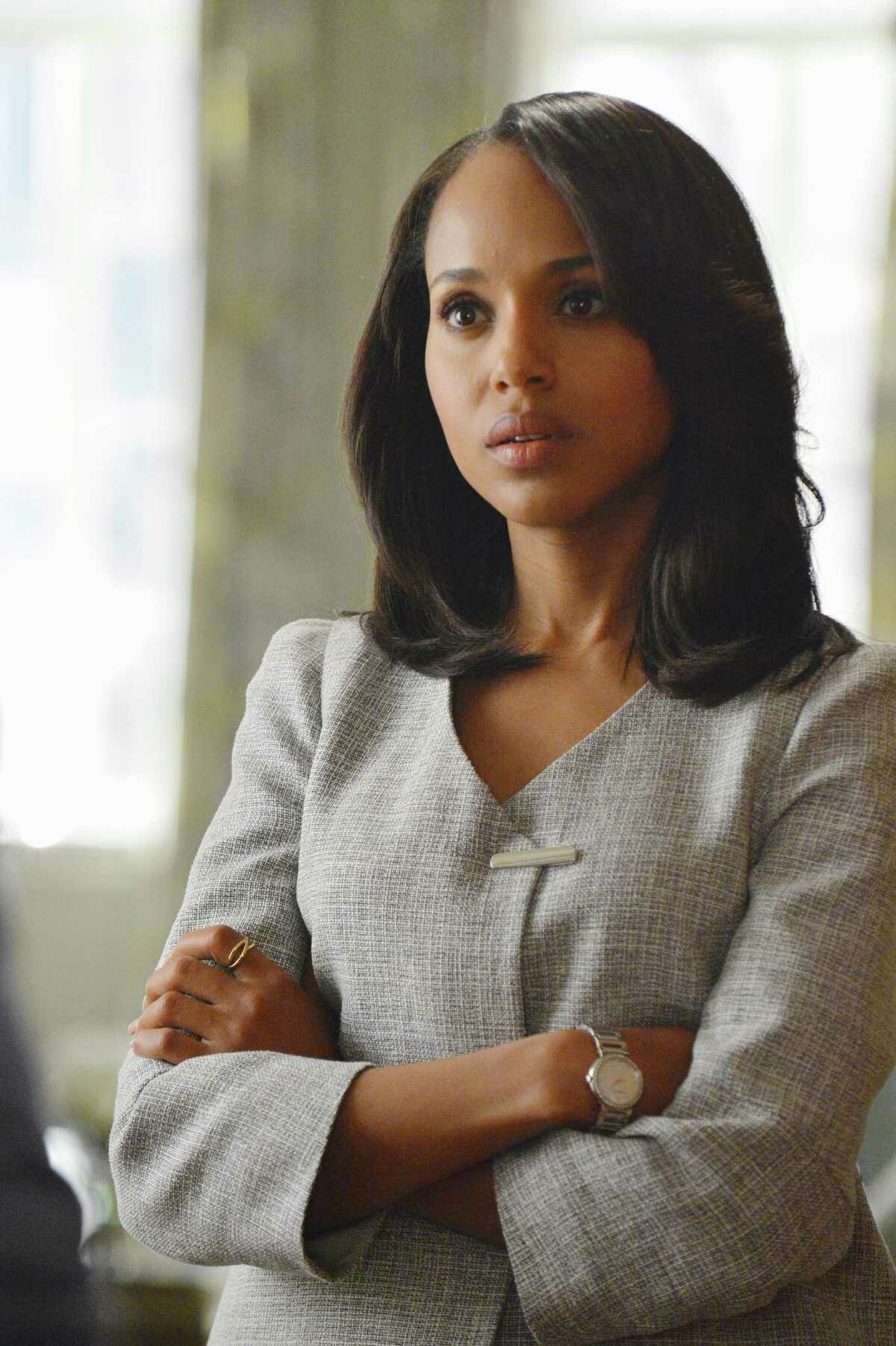 Kerry Washington plays political super-fixer Olivia Pope. Washington, who's married to football player Nnamdi Asomugha (NAHM'-dee AH'-suhm-wah), is pregnant, which may be part of the reason why ABC is shortening the current season by three episodes.