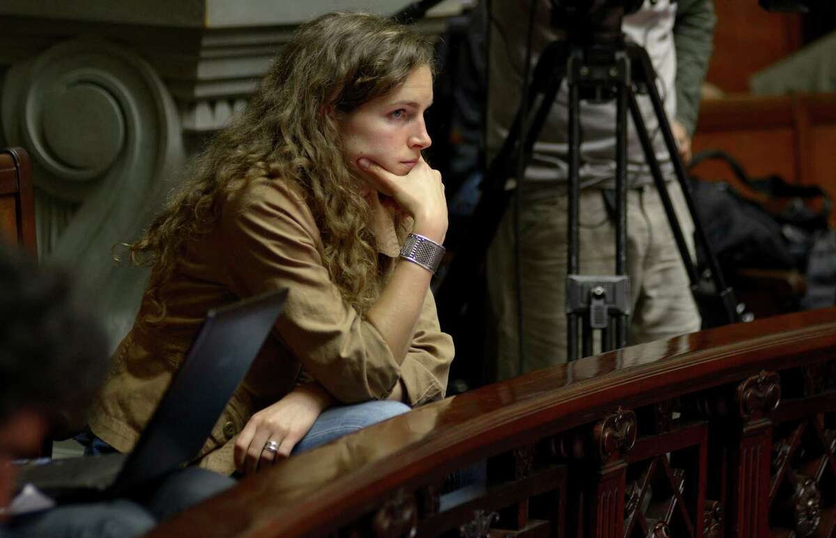 Hannah Hetzer watches senators debate the creation of the first national marijuana market, with the state regulating the entire process of growing, selling and using the drug, in Montevideo, Uruguay, Tuesday, Dec. 10, 2013. Hetzer, a lobbyist for the Alliance, moved from Washington, D.C., to Montevideo for the campaign, and celebrated the Senate's expected passage. "It's about time that we see a country bravely break with the failed prohibitionist model and try an innovative, more compassionate, and smarter approach," she said in a statement Monday night. (AP Photo/Matilde Campodonico)