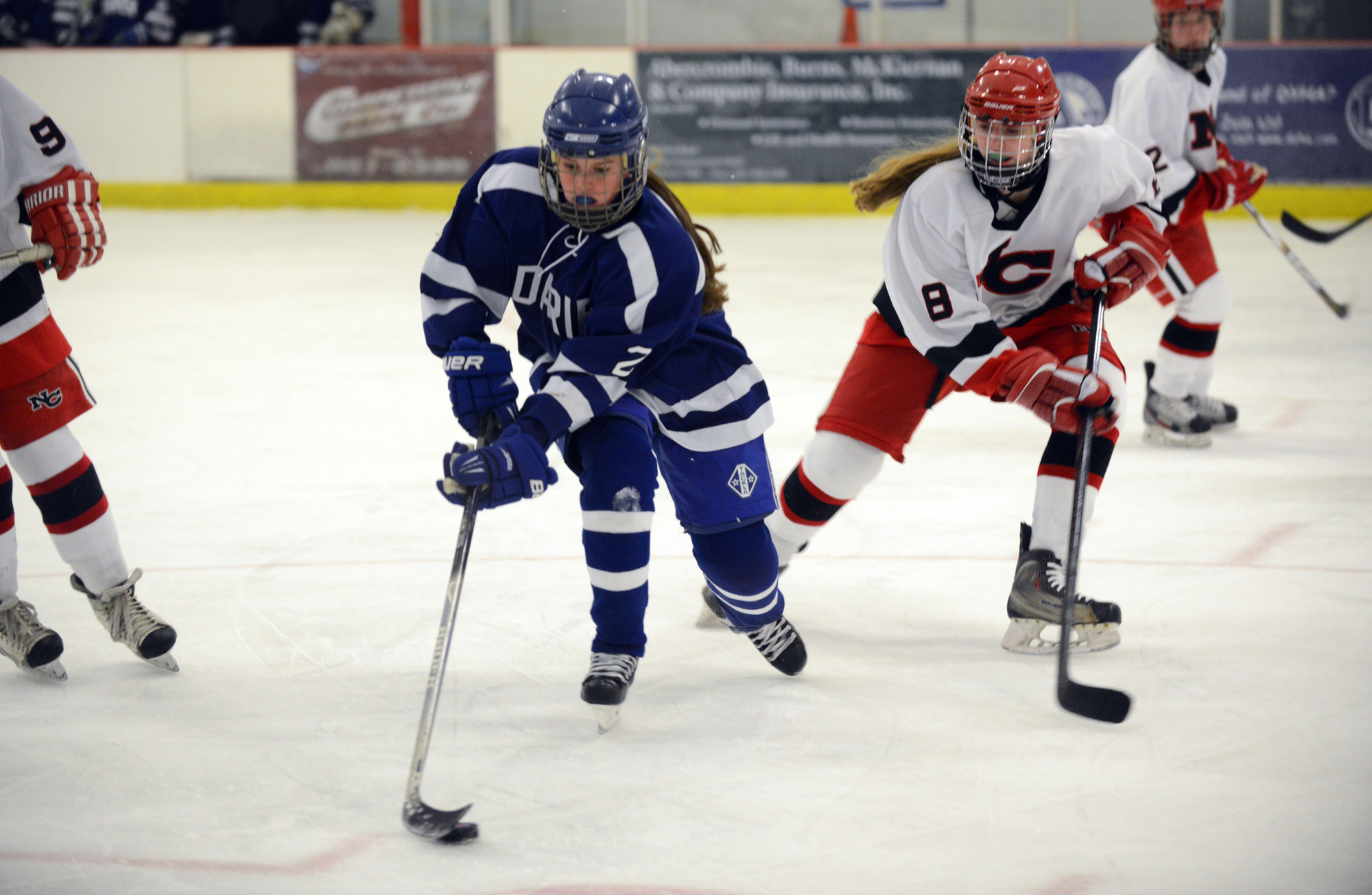 Darien girls hockey team begins FCIAC title defense with blowout win ...