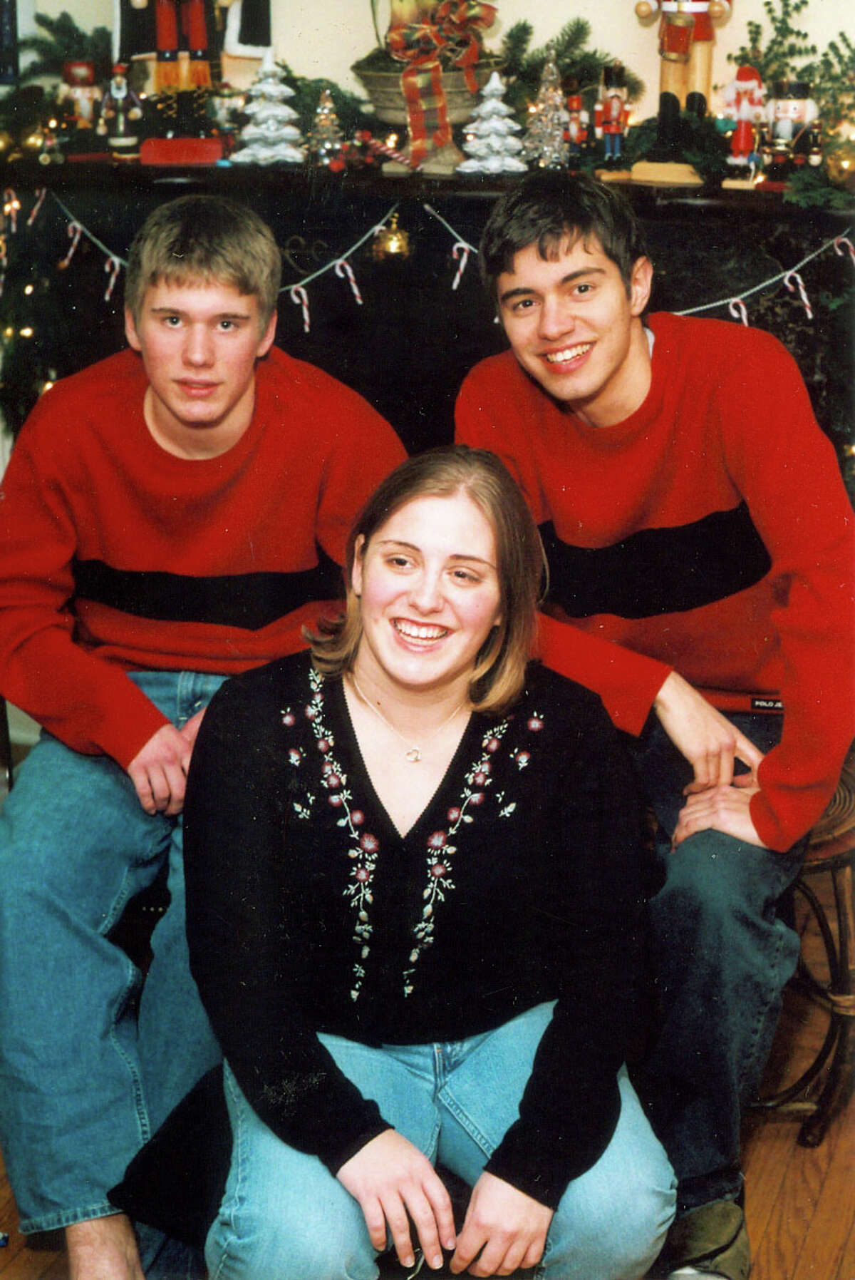 Lauren Rousseau with her brothers Andrew, left, and Matthew at Christmas 2005.