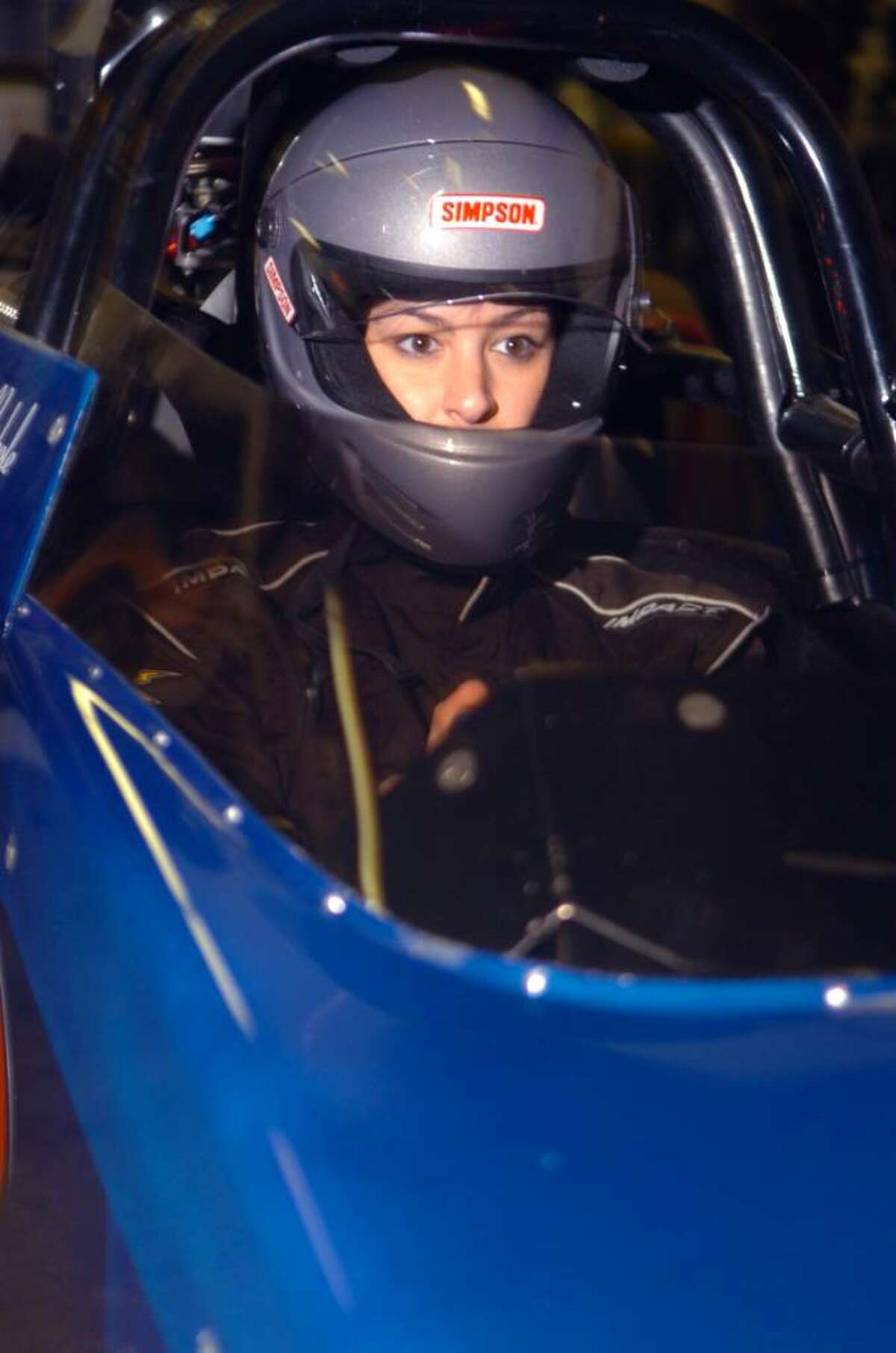 Kaitlyn Sobeski, a 24-year-old Greenwich High School graduate and former cheerleader, who is now learning to race a rear-engine dragster in Florida. She sits in the dragster, on January 24, 2010, in her father, Scotty Sobeski's, garage. Her first race will be in March.