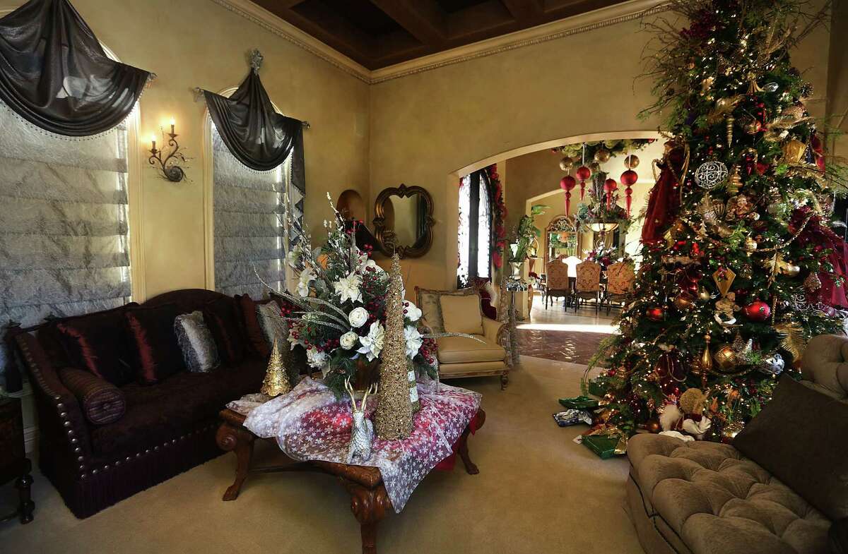 The formal living room in the home of Barbara Baldwin shows her love for Christmas. It takes about two months to decorate the home for the holidays.