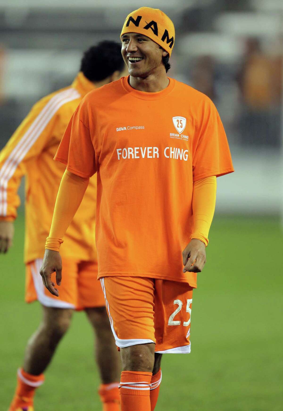 Brian Ching smiles during warmups before the Brian Ching Testimonial match, Friday, December 13, 2013, at BBVA Compass Stadium in Houston.