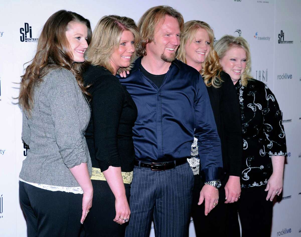 Polygamist Kody Brown, center, poses with his four wives at the opening of Mike Tyson's one-man show, "Mike Tyson: Undisputed Truth - Live on Stage" at the MGM Grand Hotel/Casino on April 14, 2012 in Las Vegas, Nevada. The Browns star in TLC's reality show, "Sister Wives."