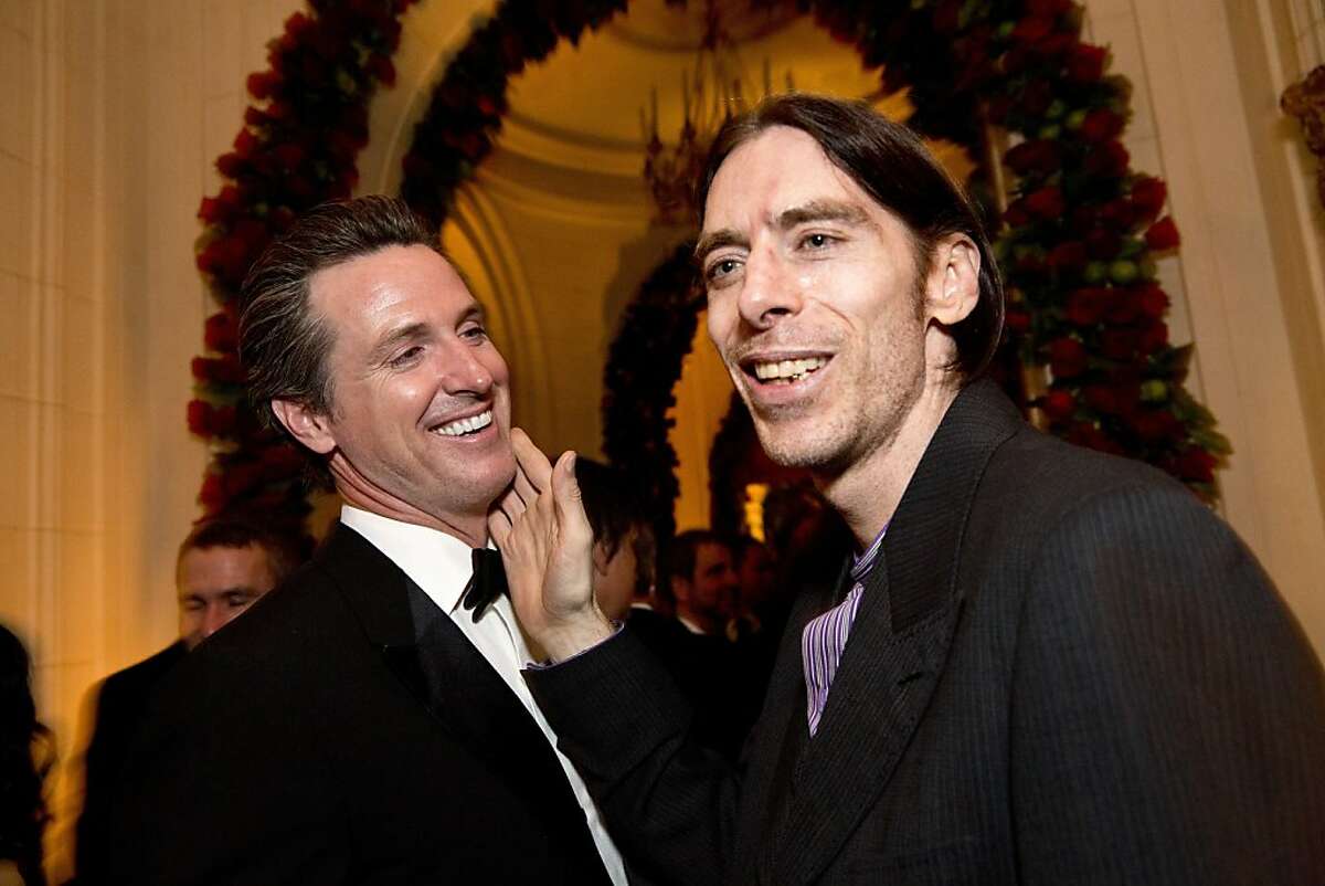 Gavin Newsom (left) talks with John Getty during Gordon Getty's 80th birthday party at the Getty's home in Pacific Heights in San Francisco, Calif., on Saturday, December 14, 2013.