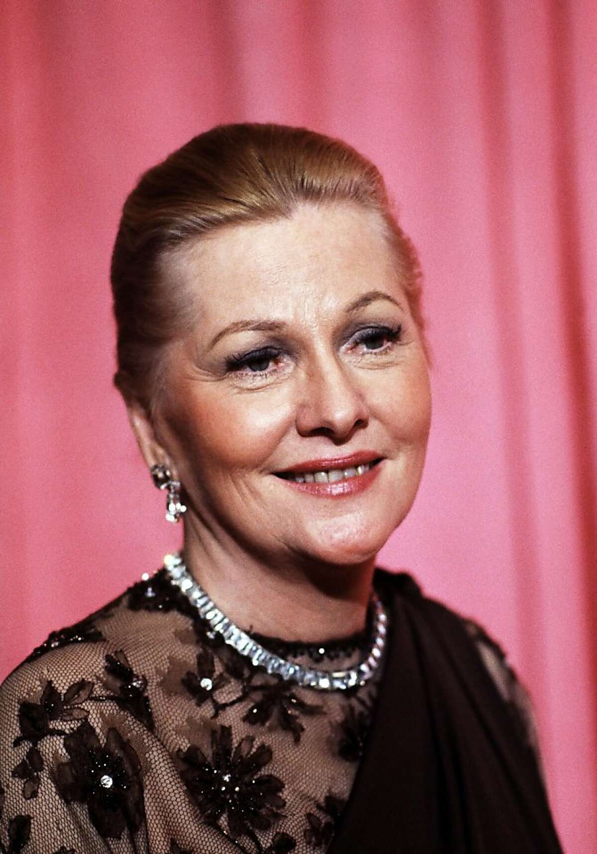 File- This April 3, 1978 file photo shows actress Joan Fontaine at the 50th Annual Academy Awards in Los Angeles. The Oscar-winning actres has died at the age of 96. Longtime friend Noel Beutel says she died in her sleep in her Carmel home Sunday, Dec. 15, 2013. (AP Photo/File)