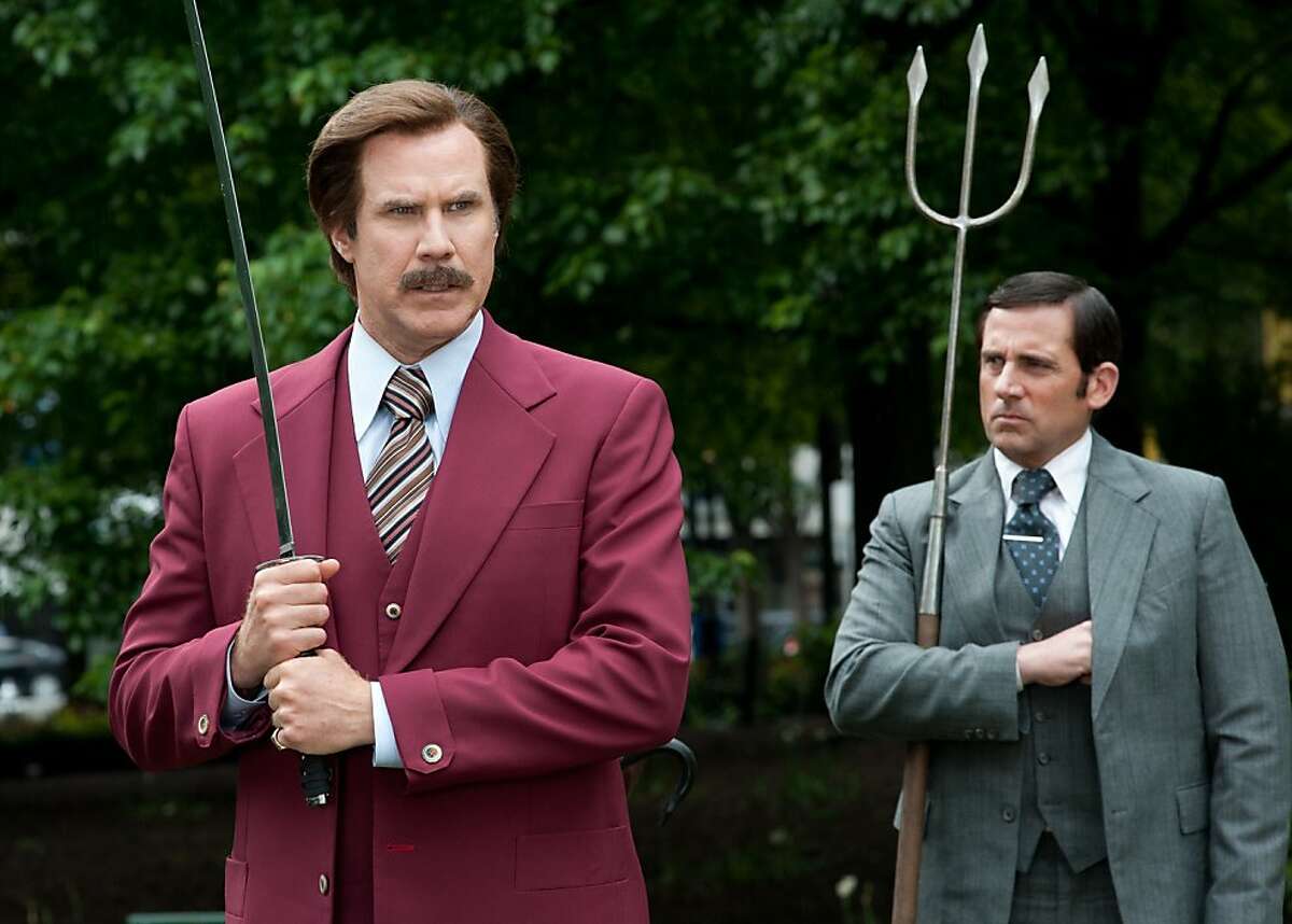 (Left to right) Will Ferrell is Ron Burgundy and Steve Carell is Brick Tamland in ANCHORMAN 2: THE LEGEND CONTINUES to be released by Paramount Pictures. A2-16378R
