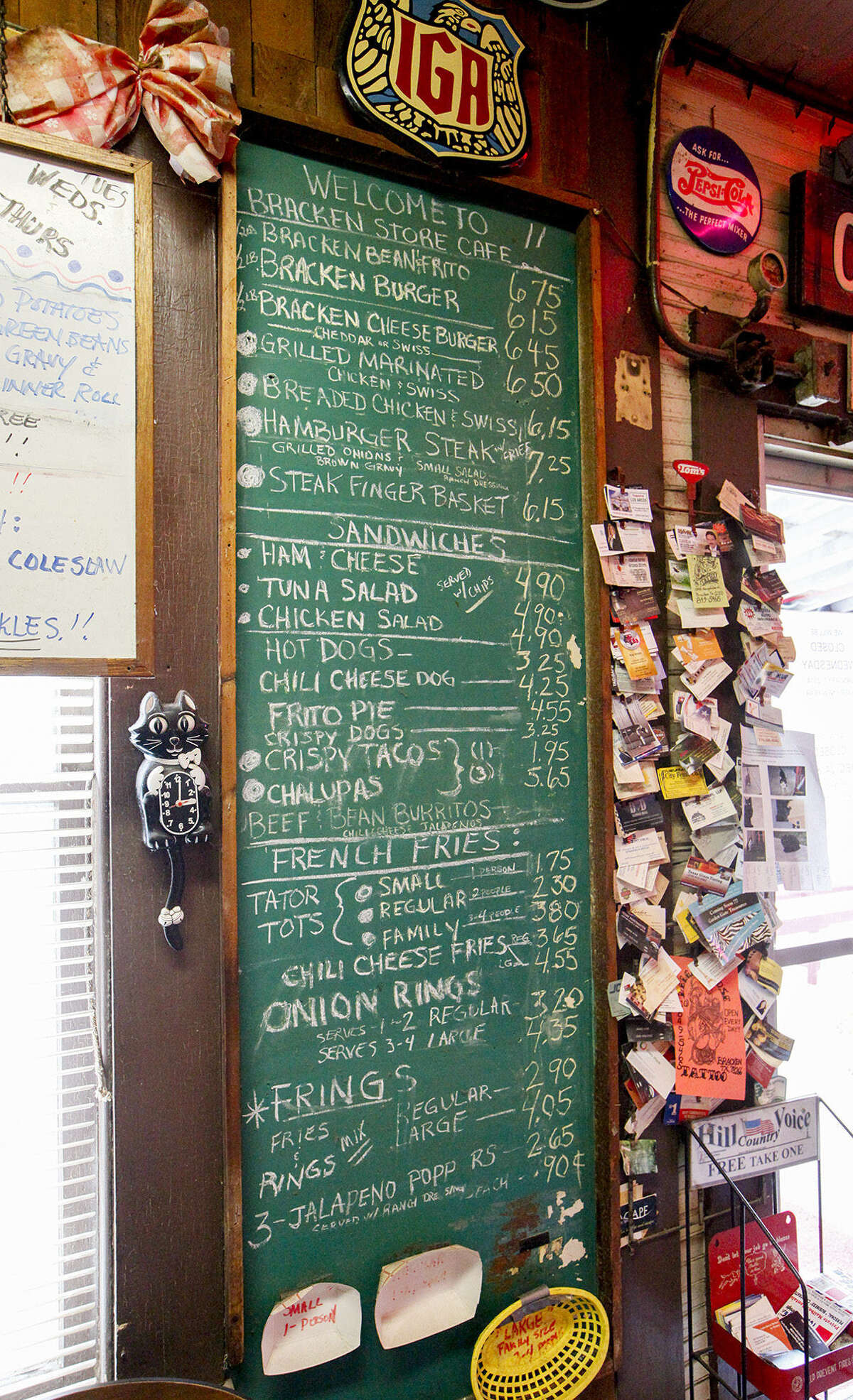 One of the wall menus at the Bracken Store Cafe lists every burger and lunch item its customers could want.