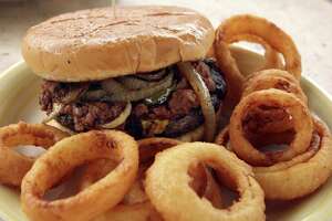 A Mama Bell Burger and onion rings from The Lord's Kitchen.
