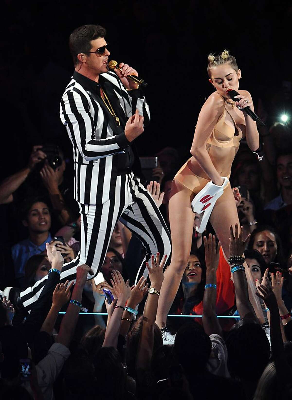 Miley Cyrus, 21, is the top choice on our list as the most-buzzed-about fashion victim thanks to her overt display of latex (and sexuality) while twerking at the MTV Video Music Awards. Even Vogue editor Anna Wintour was so appalled by the star’s lightning rod performance —and, later, by Cyrus’ barely there wardrobe choices — that she decided to nix her as the magazine’s December cover girl. Enter Cosmopolitan, which has Cyrus doused in bling on its December cover.