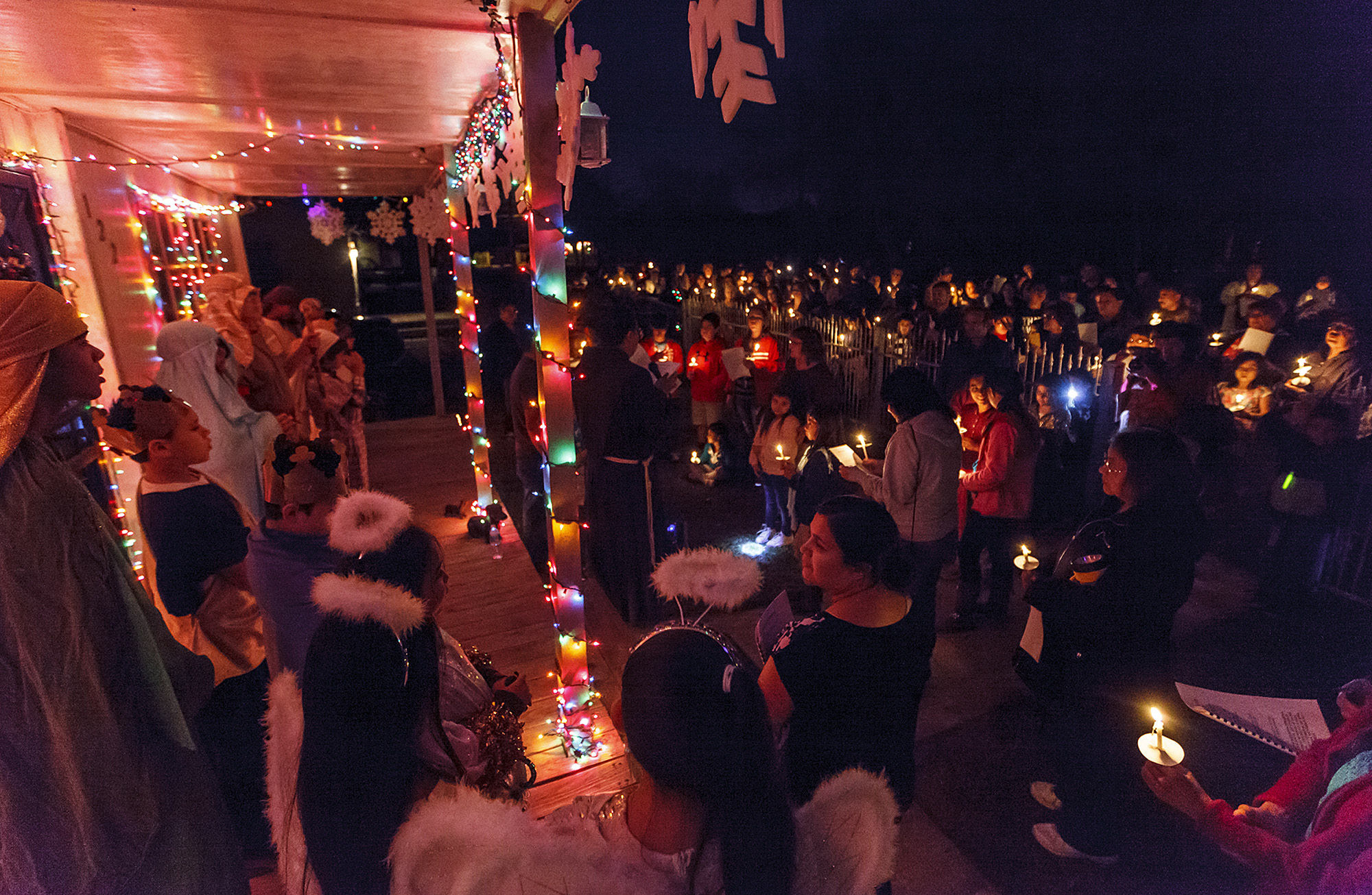 Las Posadas procession reaches across generations