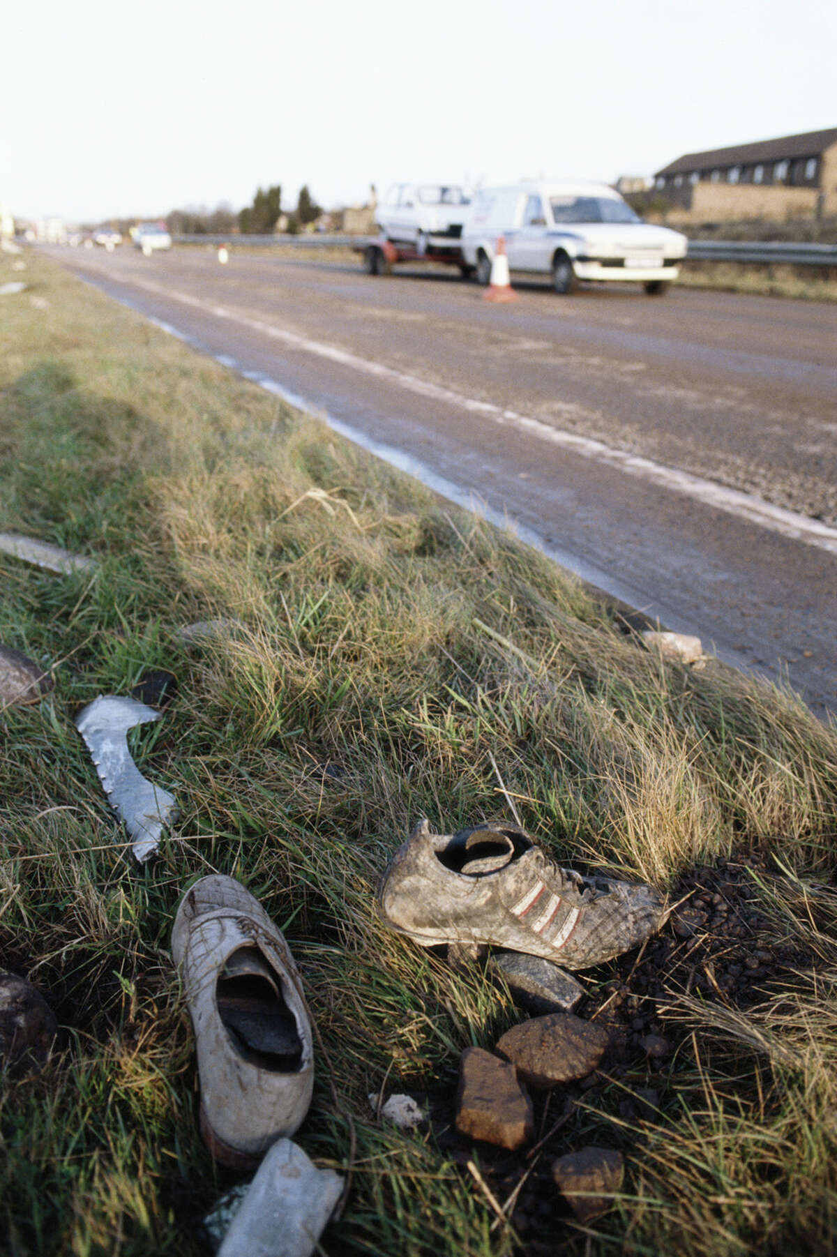 Shoes from the wreckage of Pan Am Flight 103 are seen by a roadside in the town of Lockerbie in Scotland on Dec. 22, 1988.