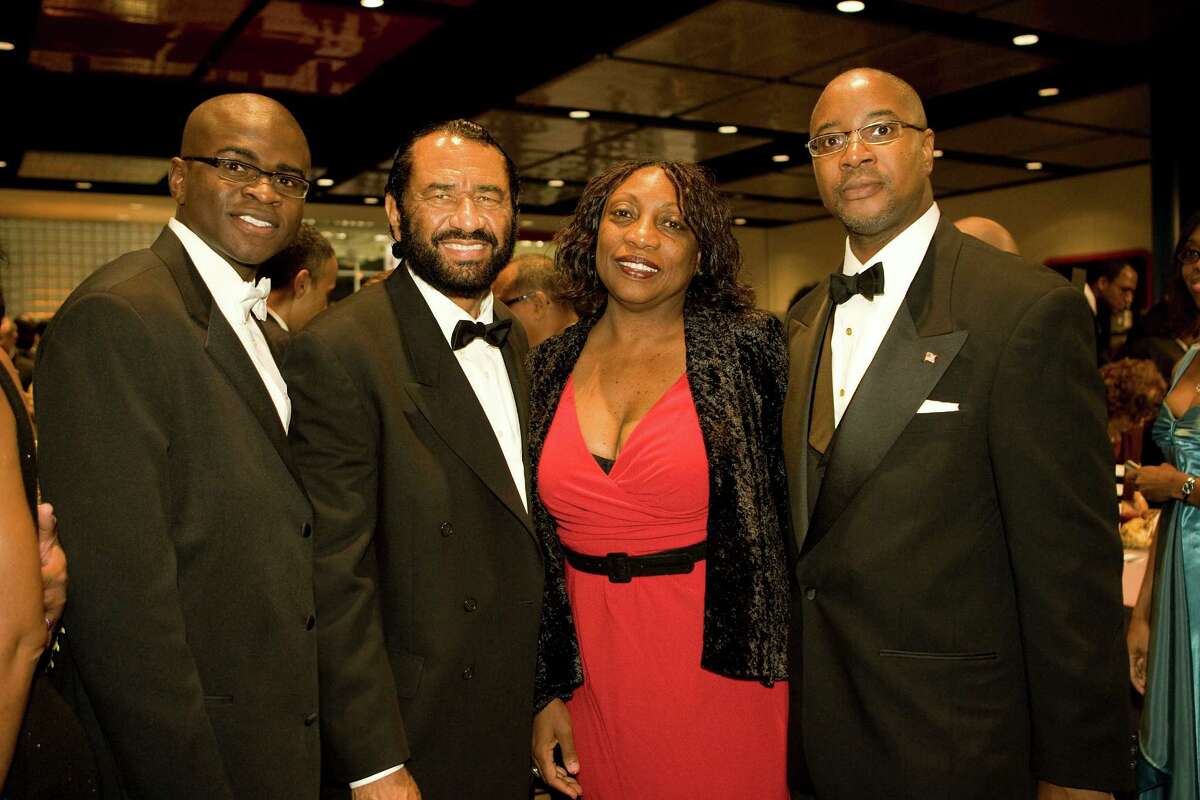 In this file photo, Laolu Davies-Yemitan, left, co-chaired a 2008 Houston Citizens Chamber of Commerce event also attended by U.S. Rep. Al Green, co-chair Dannette Davis and now-HCC trustee Carroll Robinson, right. HCC is investigating whether Robinson tried to get Davies-Yemitan hired by a college contractor.