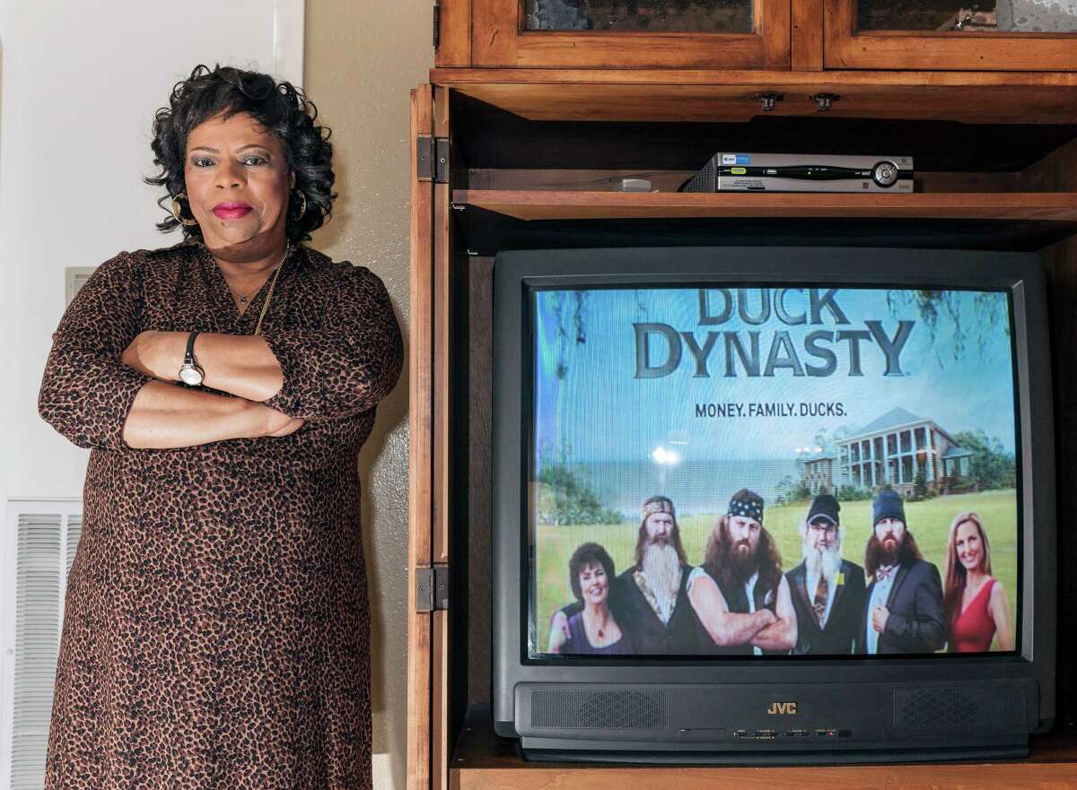 Column on Miriam Anderson, a 62-year-old Missouri City registered nurse and avid watcher of the popular A&E Show Duck Dynasty. Originally from West Monroe, La., where the show is set, Anderson felt connected to the characters and their southern way of life. Then came Phil Robertson's comments dismissing black discrimination during Jim Crow. Anderson was also stung by revelations about Paula Deen earlier this year and owns many of Deen's cookbooks, though she hasn't cooked any of Deen's recipes since the news broke. 12/21/13 (Craig H. Hartley/For the Chronicle)