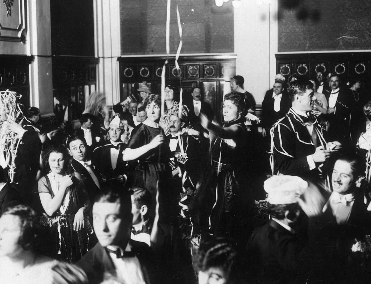 Revelers celebrate the New Year during a party at the Hotel Victoria in London on Jan. 1, 1921.