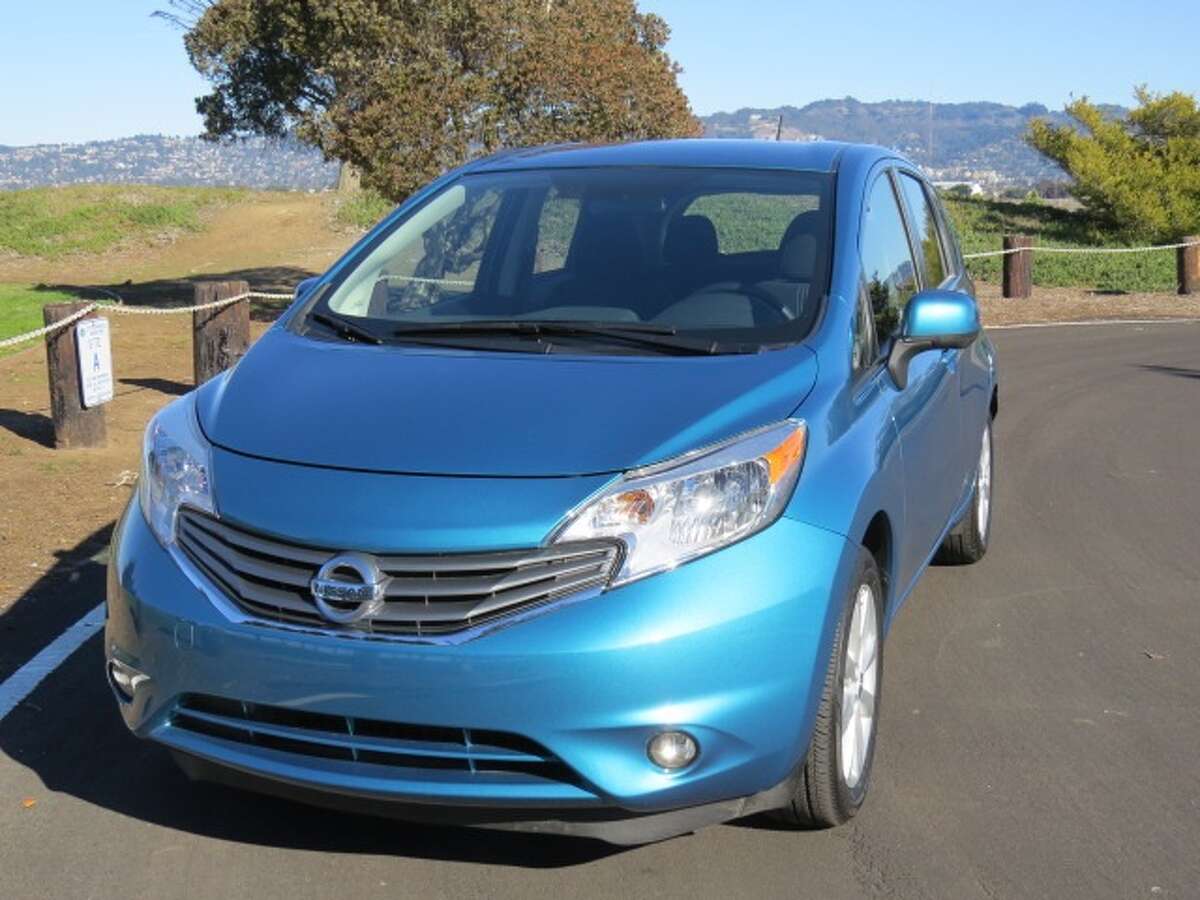 The 2014 Nissan Versa Note is one of many small cars that sell for under $20,000 and are easy on gas. The problem with the Note is that it does everything asked of it, but that's about it. Not much fun, not much flair. (All photos by Michael Taylor)