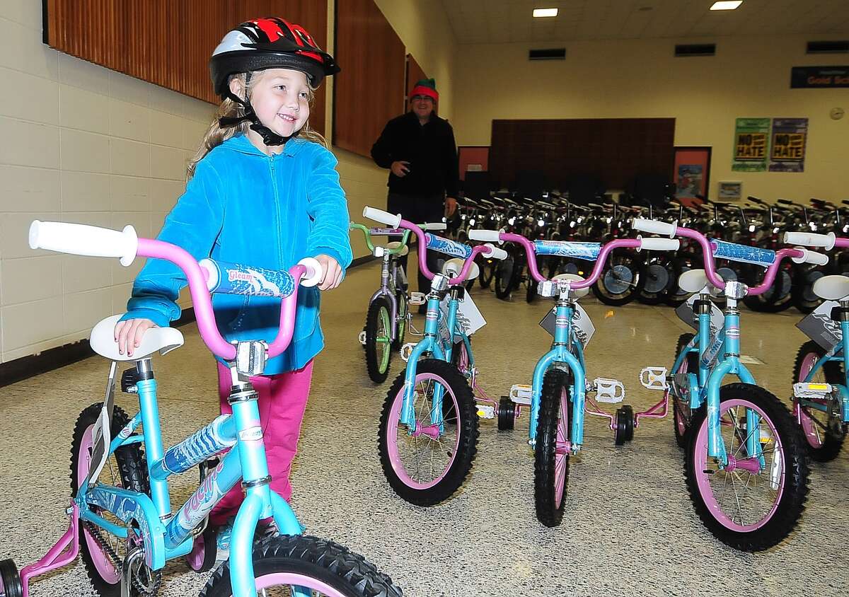 Kids earn their bicycles through Elves and More