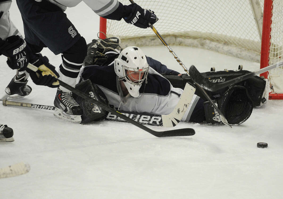 In the line of fire High school hockey goalies