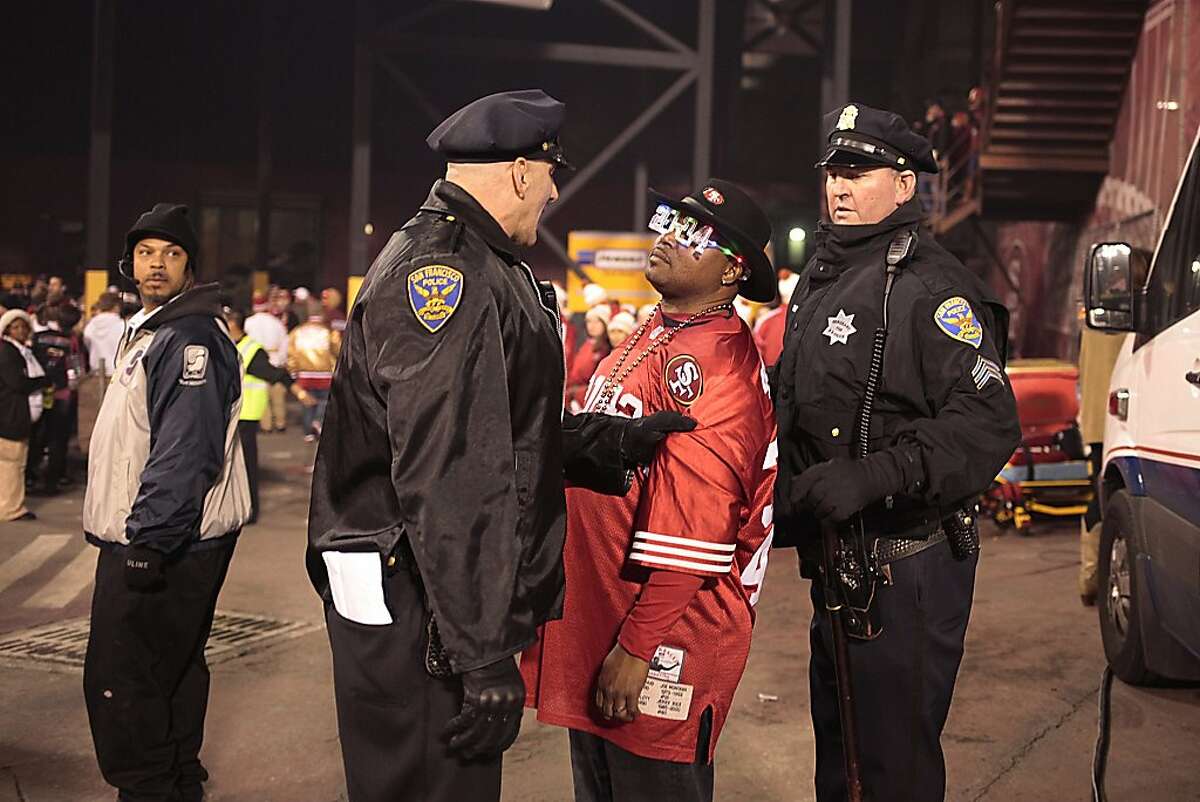 A fan is arrested at Candlestick Park after San Francisco 49ers last game at the park in San Francisco, Calif. on Monday Dec. 23, 2013. The San Francisco 49ers hosted the Atlanta Falcons at one of their last games at Candlestick Park.