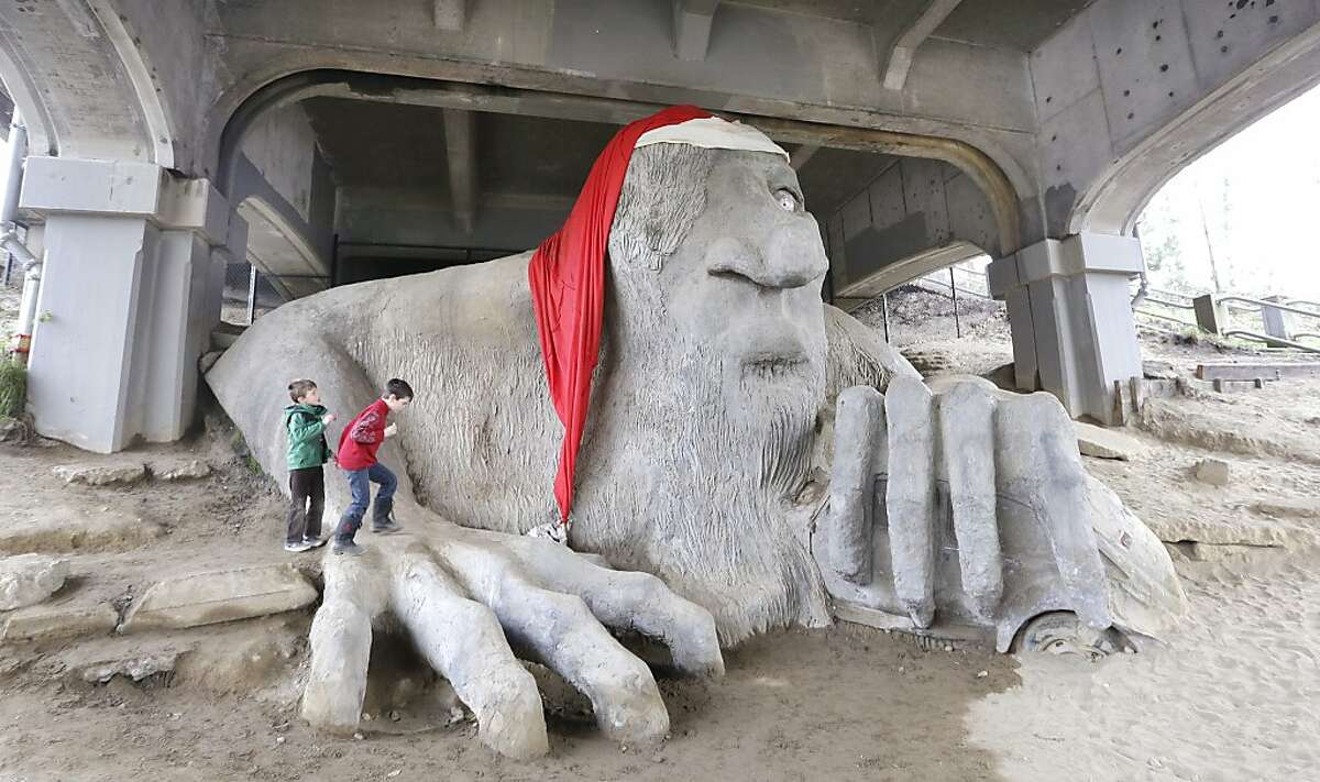 clamber onto an 18-foot tall troll sculpture sporting a giant