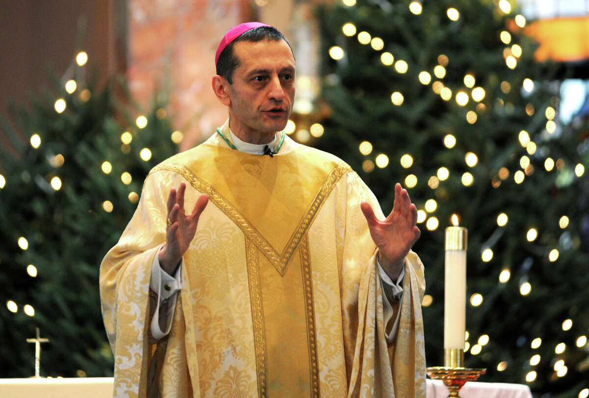 Bishop Frank Caggiano leads Christmas Day Mass at Saint Aloysius Church, in New Canaan, Conn. Dec. 25, 2013.