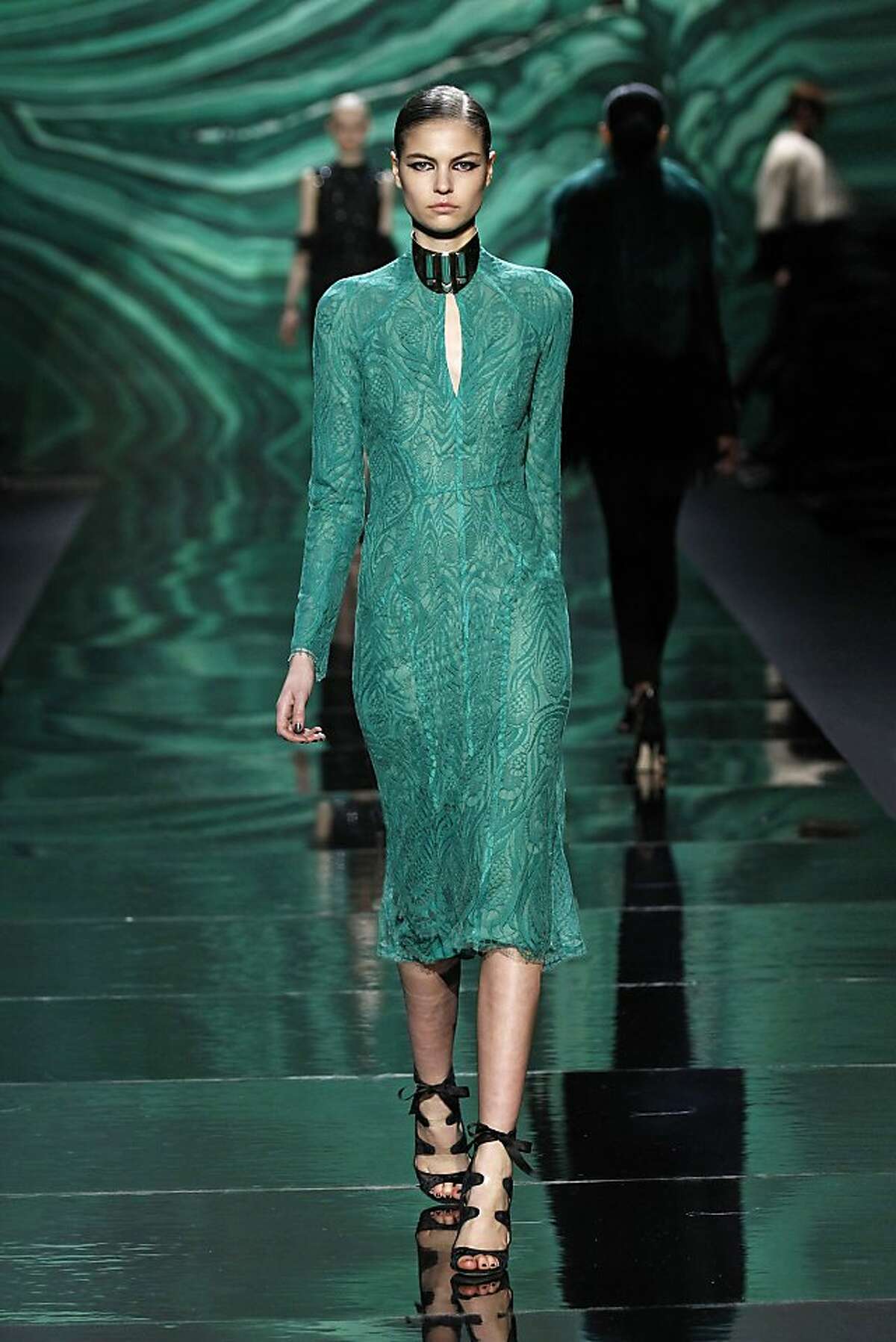 Designer Monique Lhuillier was one of many to embrace Pantone's 2013 color of the year, emerald, in her Fall 2013 collection.