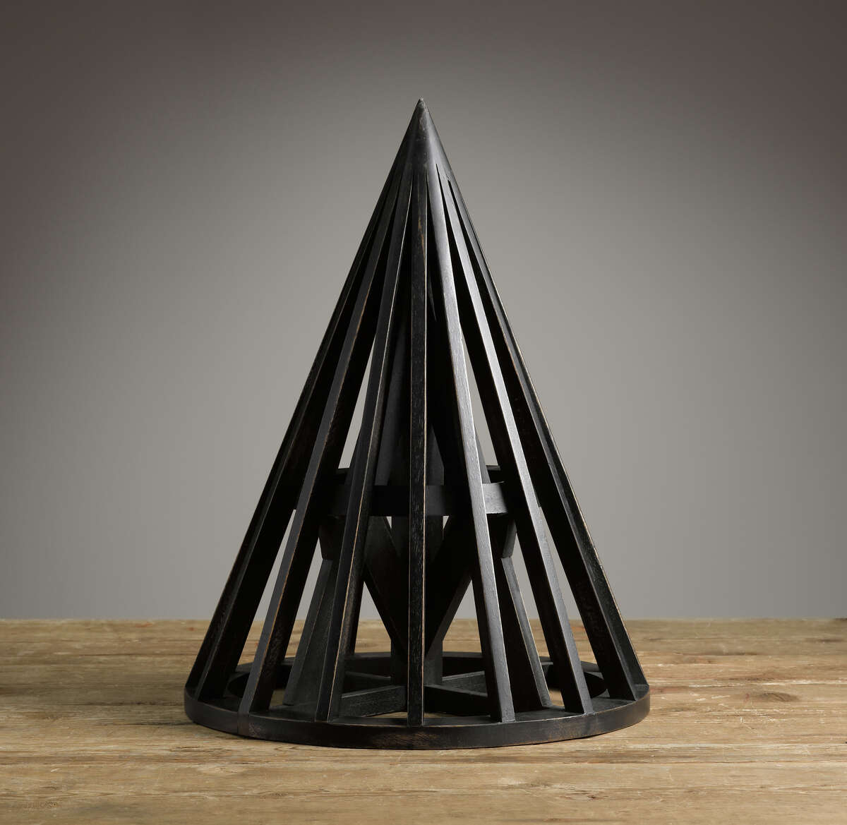 This publicity photo released by Restoration Hardware shows a black Belgian wooden maquette, a scaled replicas of a model used by an architect to study form, structure and proportion. Geometric shapes are strong decor elements for Fall 2013 (www.restorationhardware.com). (AP Photo/Restoration Hardware) ORG XMIT: NYLS207
