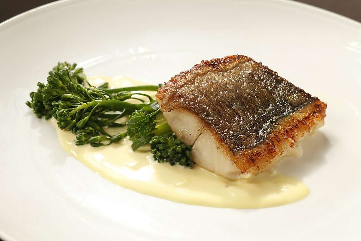 Black cod with saffron cream sauce as seen in San Francisco, California on Wednesday December 11, 2013. Food styled by Lynne Bennett.