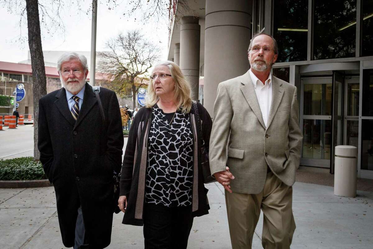 Attorney George Parnham, left, joined by the parents of Conrad Barrett, was unable to get the 27-year-old Katy resident released on bail Friday in connection with an alleged Nov. 24 attack on an elderly black man.