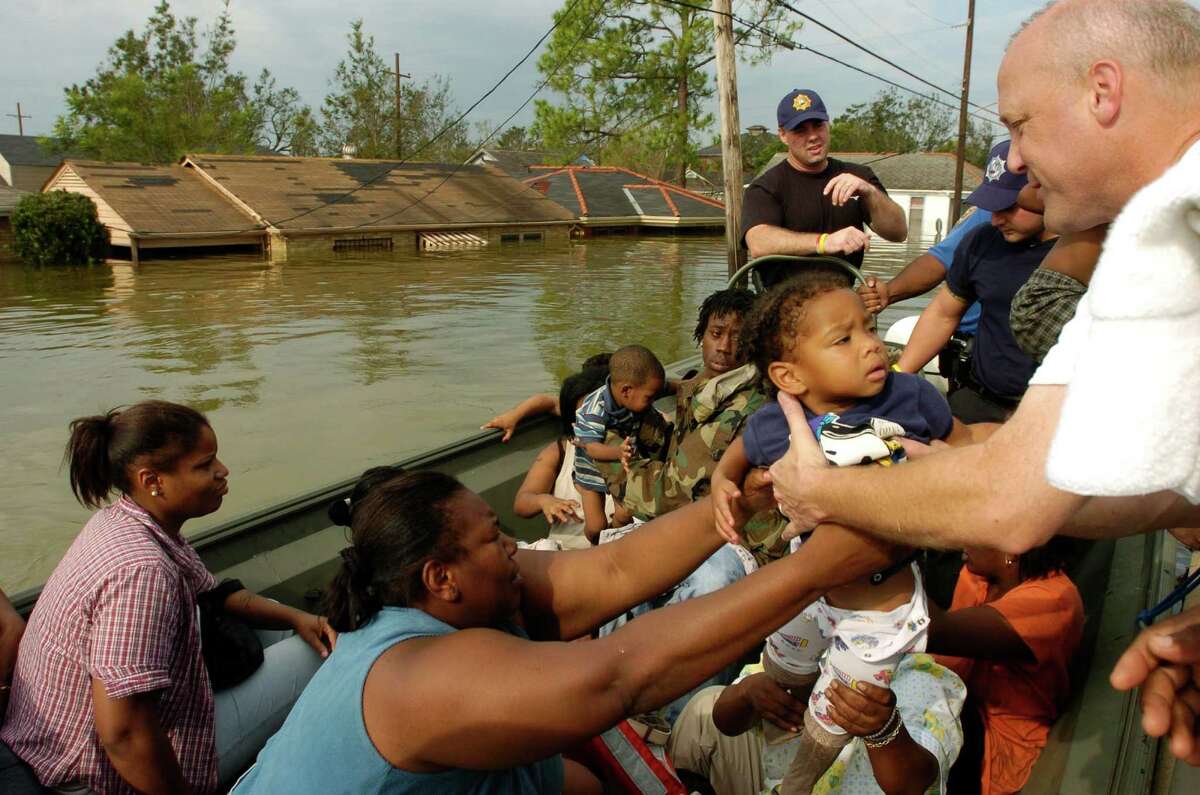 Then-Louisiana Lt. Gov. Mitch Landrieu helps in 2005 in New Orleans after Katrina hit. Suits against the Army Corps of Engineers have been dismissed.
