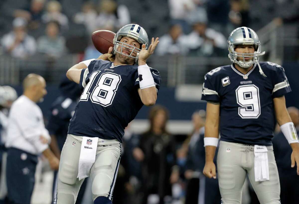 FILE - In this Nov. 28, 2013, file photo, Dallas Cowboys quarterbacks Kyle Orton (18) warms up as and Tony Romo (9) looks on before an NFL football game in Arlington, Texas. Coach Jason Garrett said Romo had back surgery on Friday, Dec. 27, 2013, and that Orton will start when Dallas faces Philadelphia on Sunday night with the NFC East title and a postseason berth on the line.(AP Photo/Brandon Wade, File)