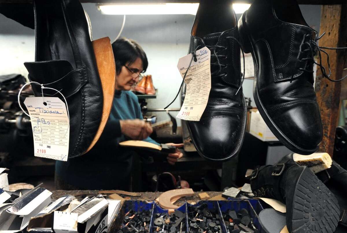 On Tuesday October 17, 1967, Colonie Shoe Repair was purchased by Alberico & Anna Conte after their immigration to America from their homeland of Italy. Since the age of six, Alberico has had a lifetime of experience in the cobbling trade, working internationally from Italy, to Venezuela and for the past four decades, in the United States. After returning briefly to Italy in 1966, Alberico was introduced to Anna Russo, and after their marriage, Alberico returned to America with his bride and they established their new business together. Anna Conte works at her Colonie Shoe Repair on Thursday March 7, 2013 in Colonie, N.Y. (Michael P. Farrell/Times Union)