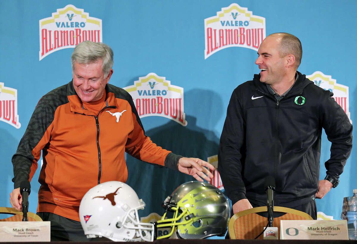 Texas and Oregon will provide quite a contrast when they meet tonight in the Valero Alamo Bowl. Click ahead to see Express-News college football writer Tim Griffin's take on how the schools are alike, and how they differ. Which school comes out on top? You decide. Texas Longhorns head coach Mack Brown (left) and Oregon Ducks head coach Mark Helfrich joke after a press conference Sunday Dec. 29, 2013 at the Marriott Riverwalk. The Longhorns and Ducks will play in the Valero Alamo Bowl Monday Dec. 30, 2013 at the Alamodome.